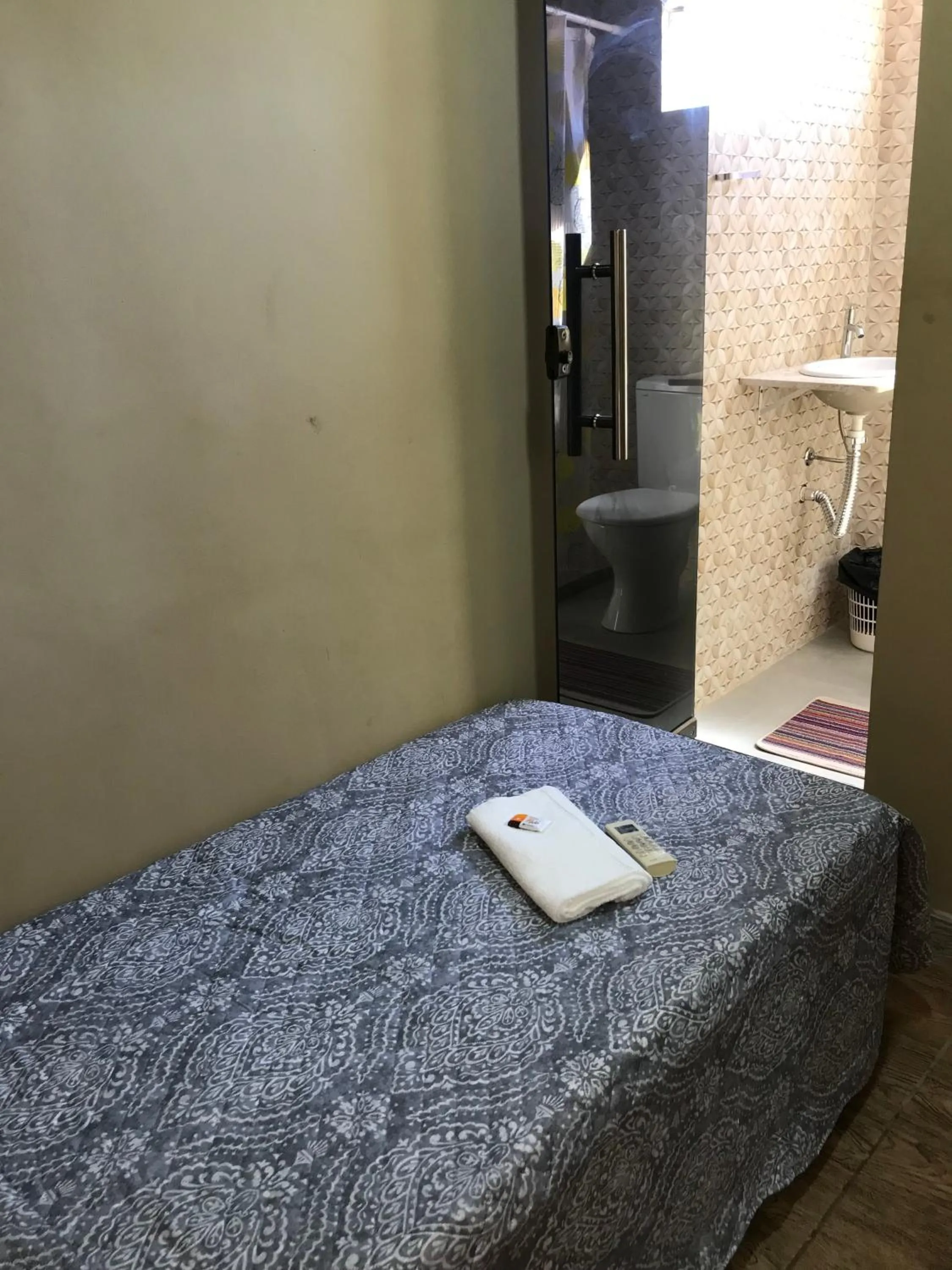 Bed in Pousada Floripes