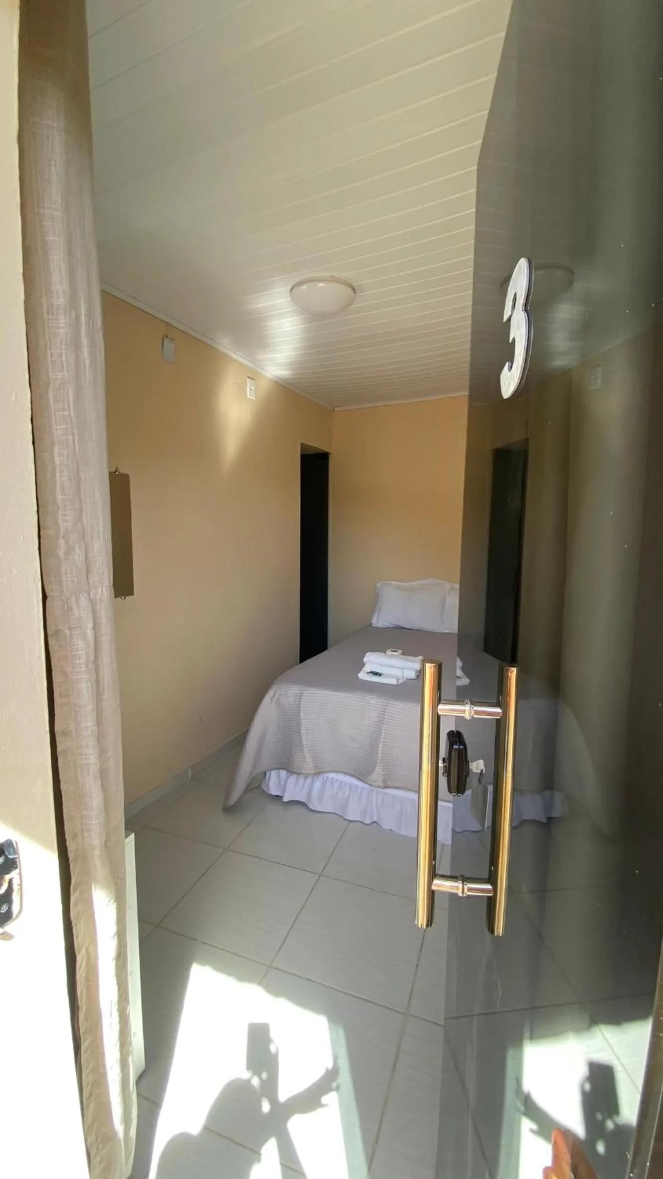 Property building, Bed in Pousada Floripes