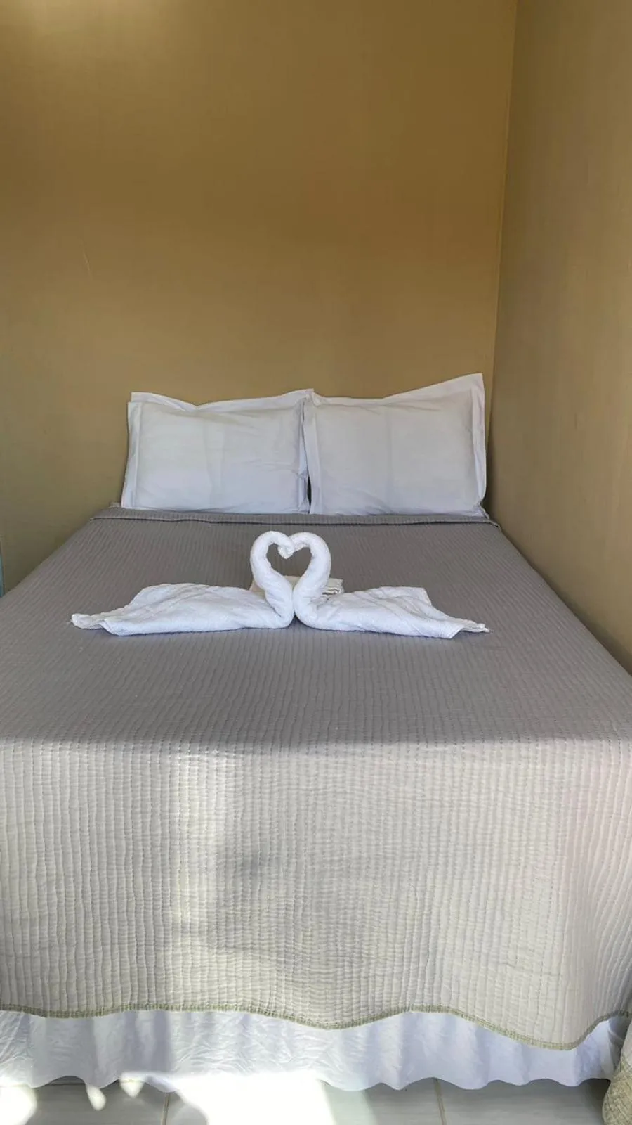 Bed in Pousada Floripes