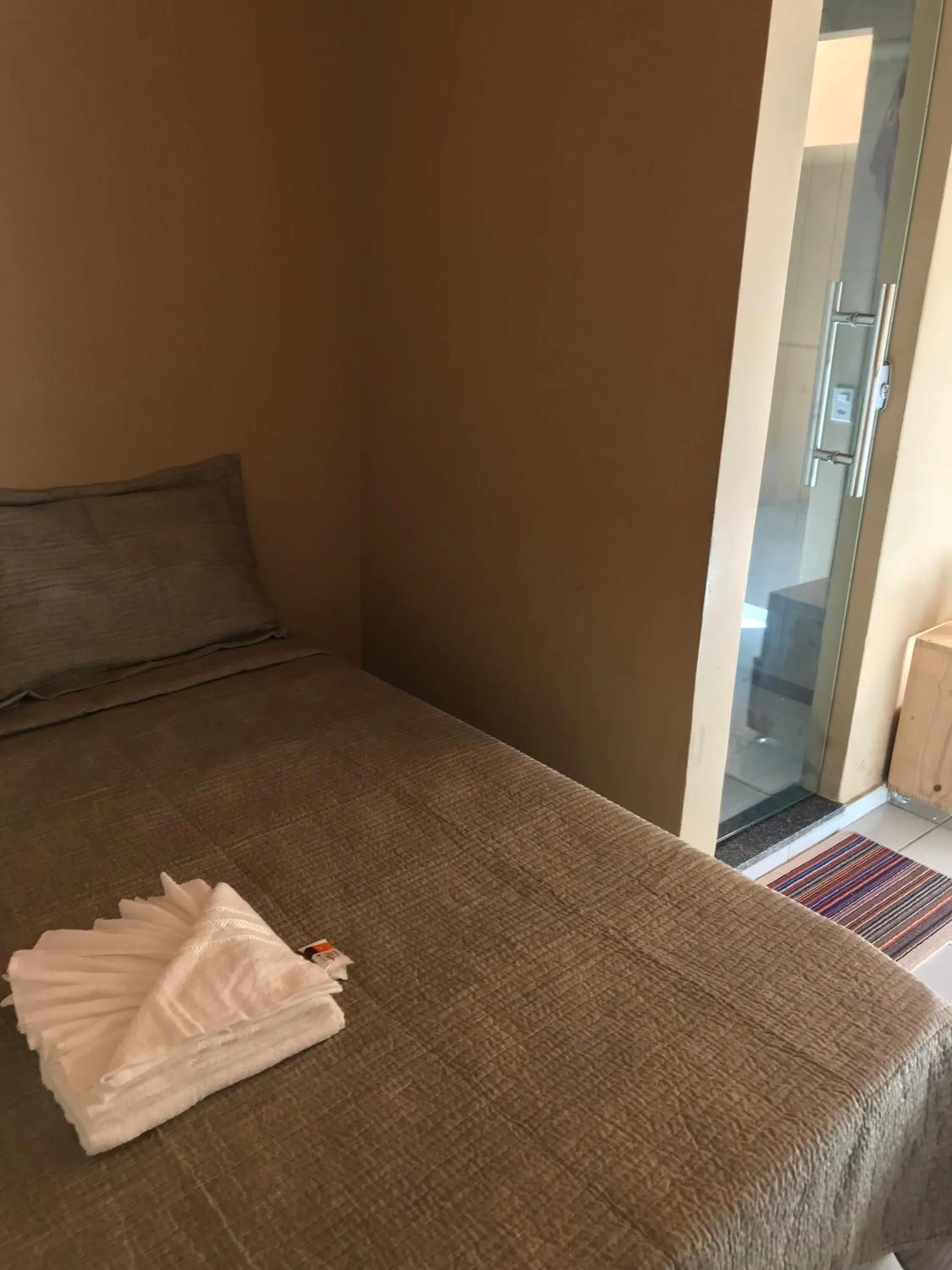 Bed in Pousada Floripes