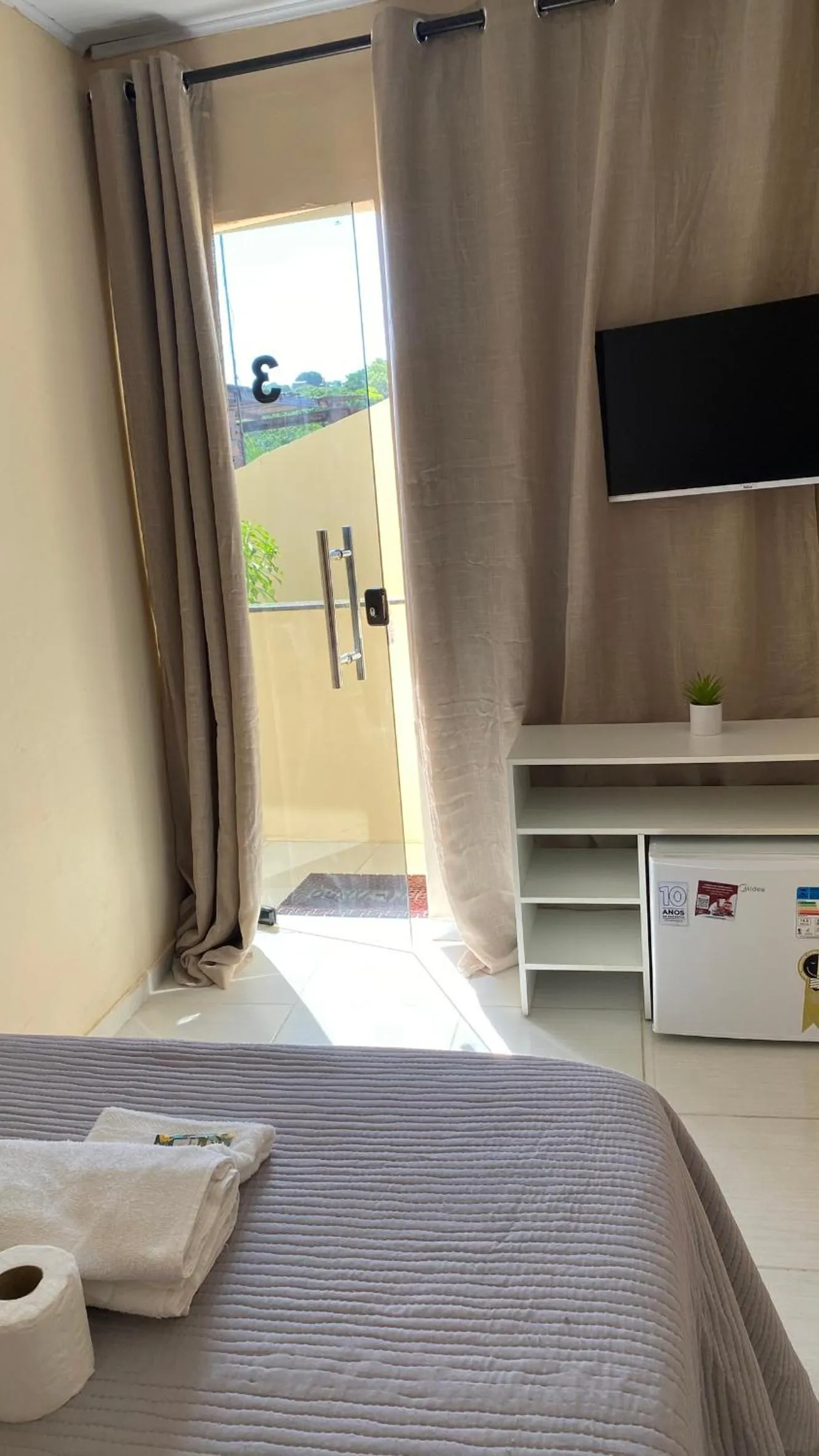 Property building, Bed in Pousada Floripes