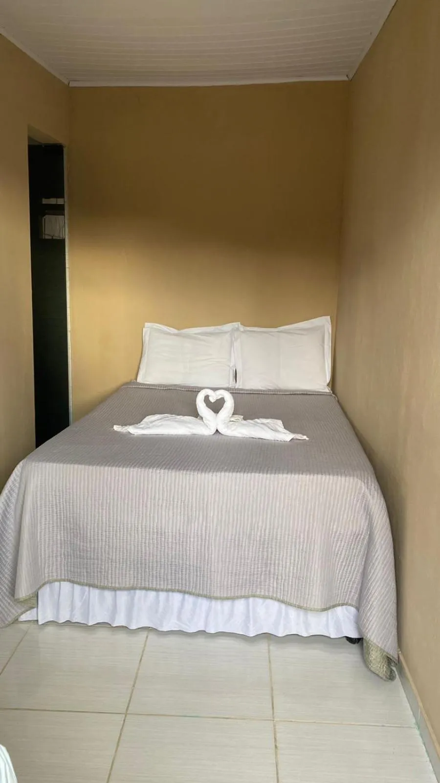 Bed in Pousada Floripes