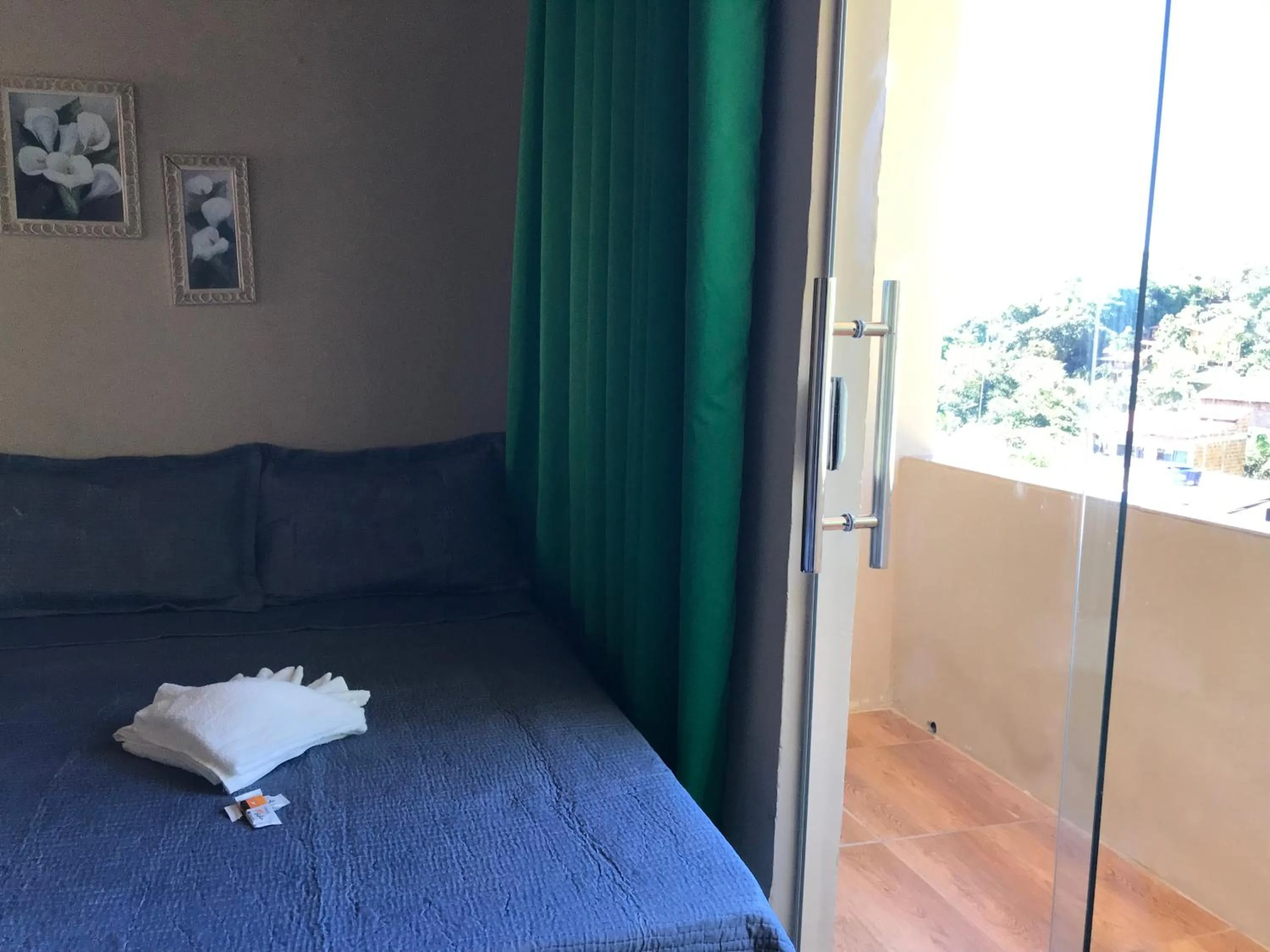 Bed in Pousada Floripes