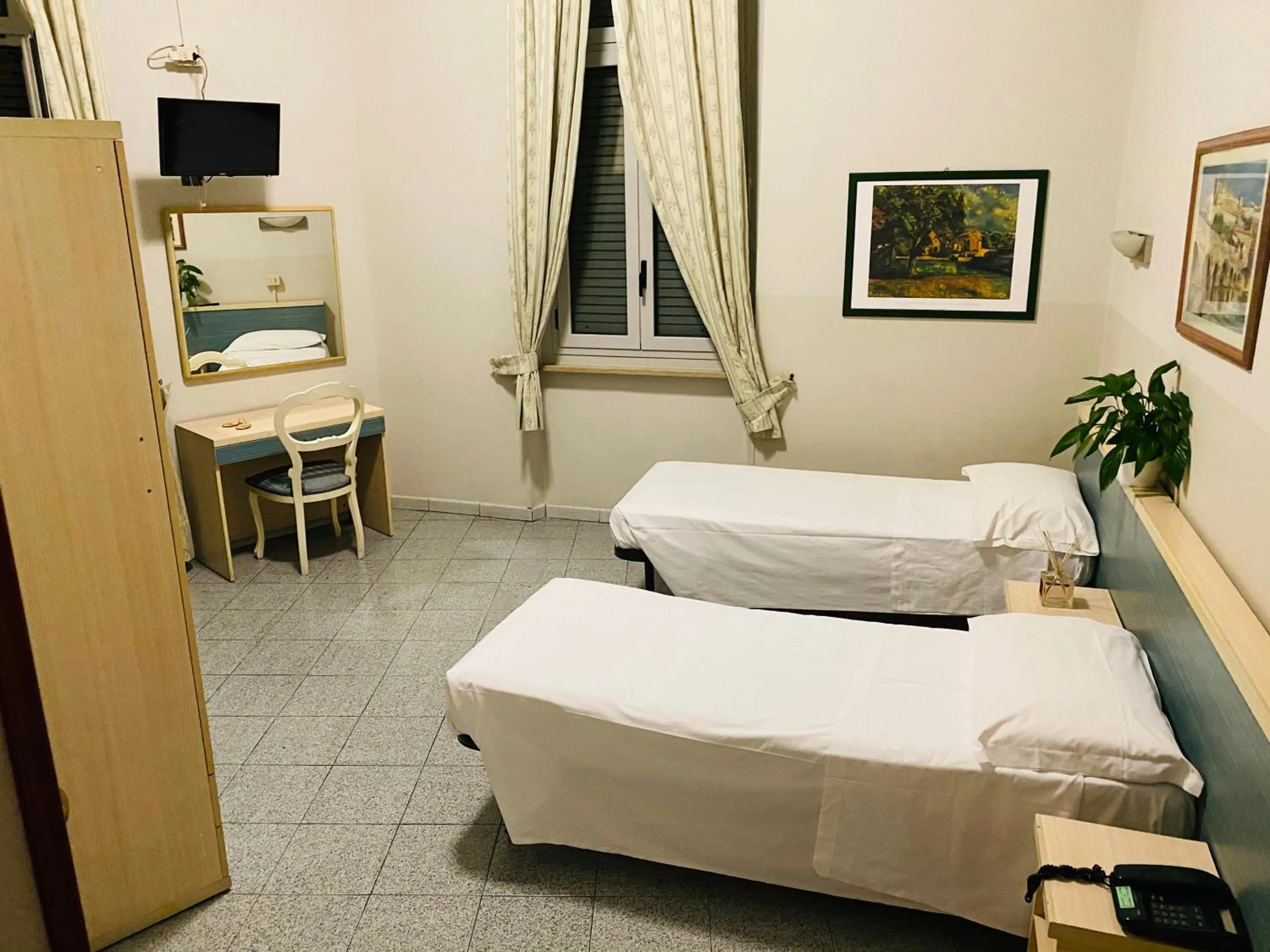 Bed in Hotel Ferrucci