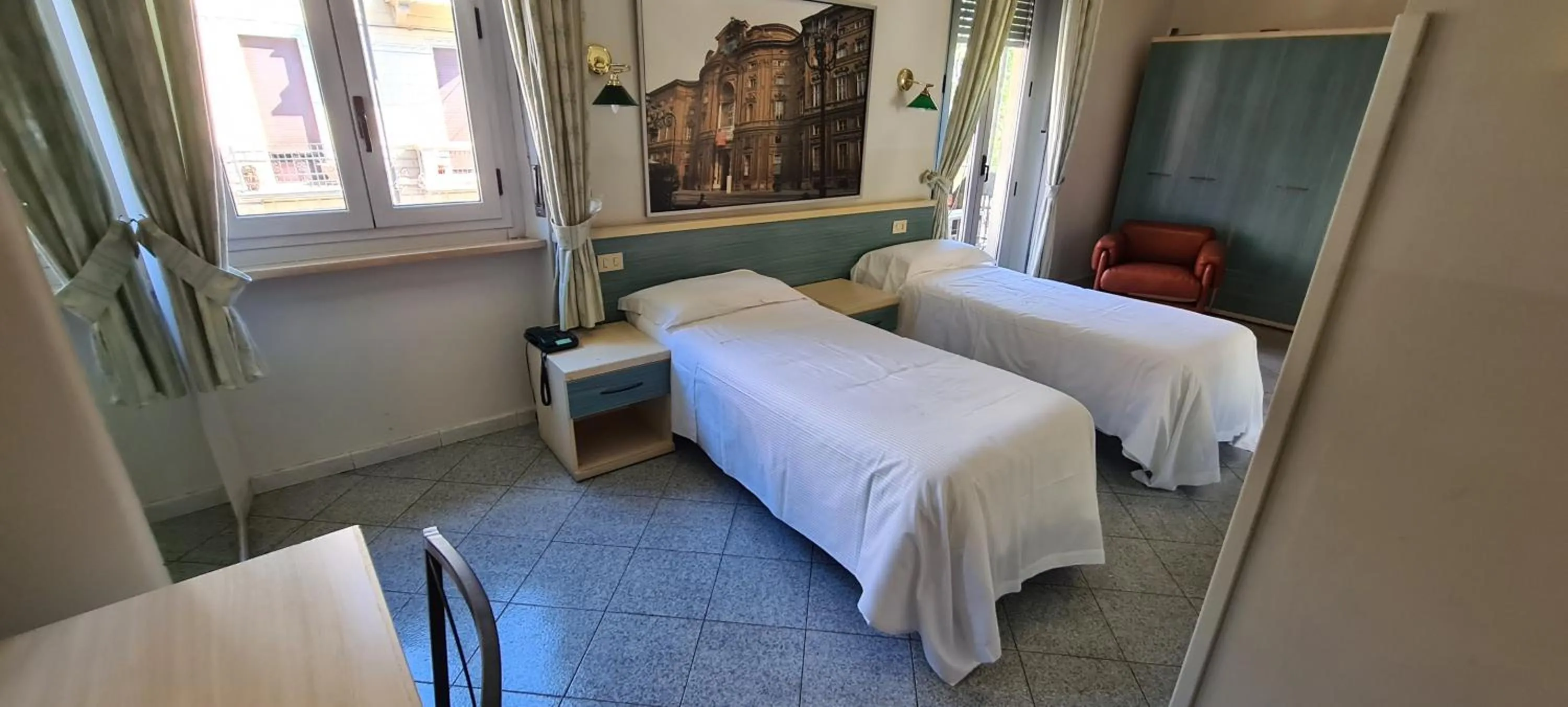 Bed in Hotel Ferrucci
