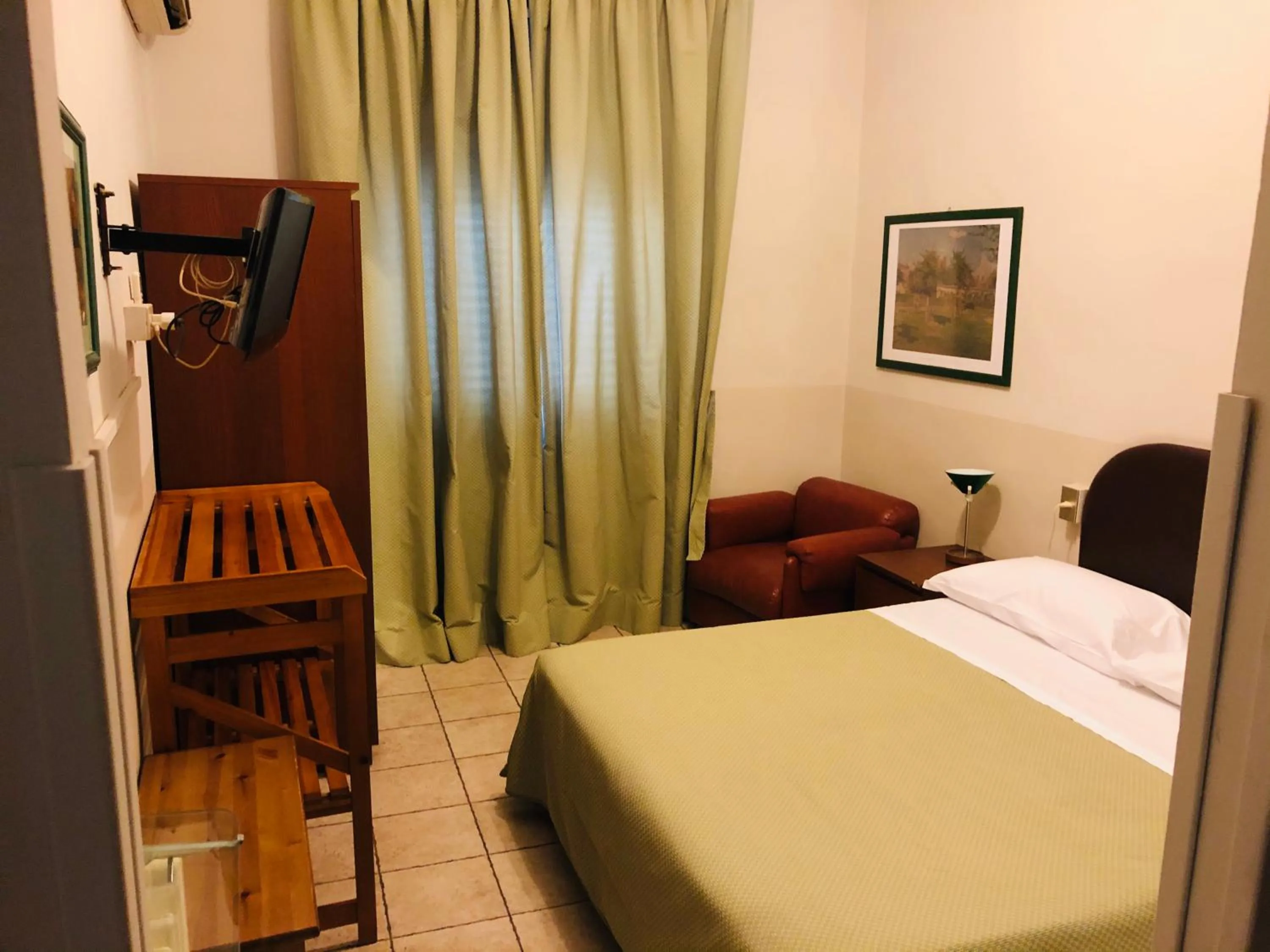 Bed in Hotel Ferrucci