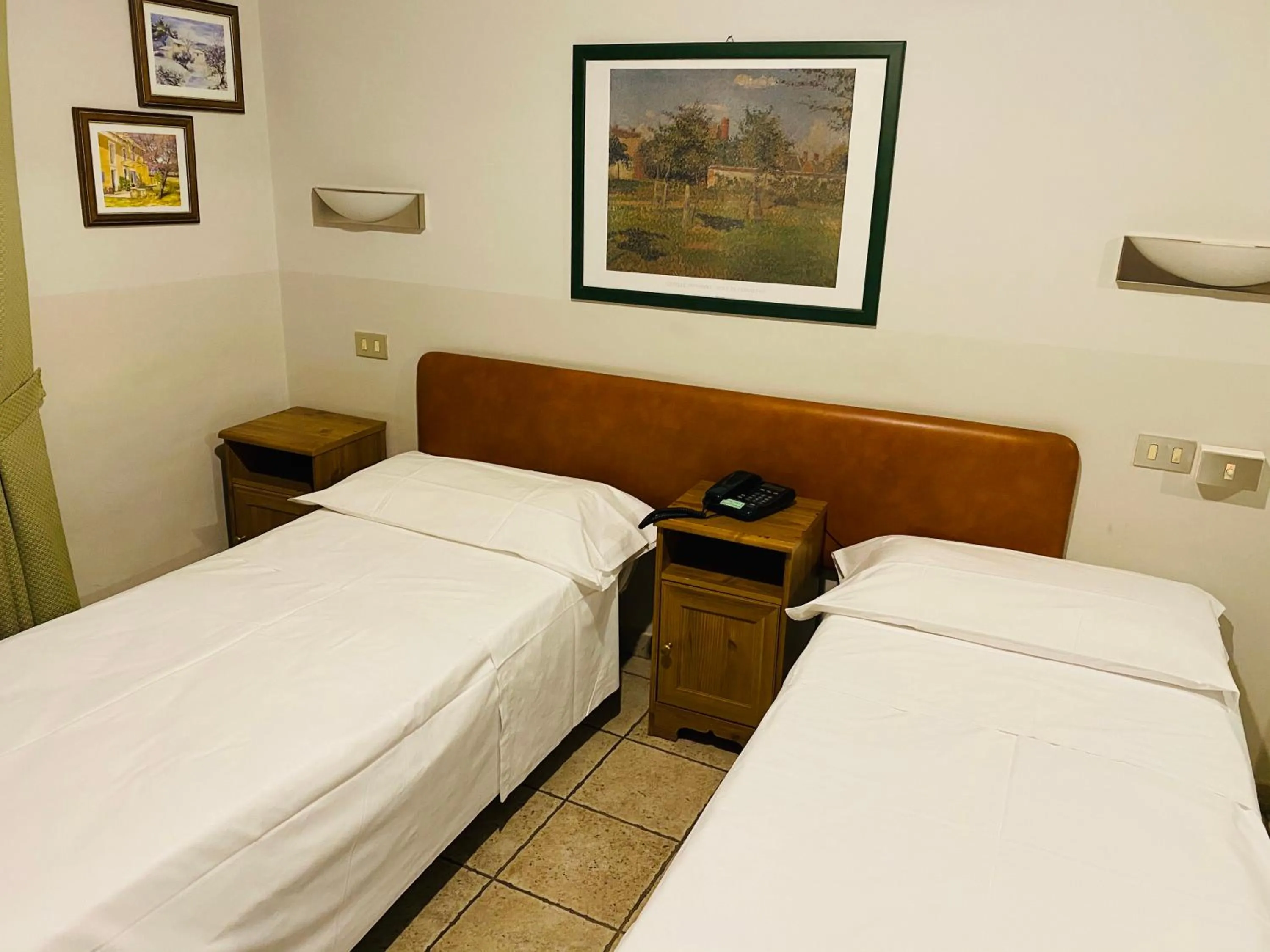 Bed in Hotel Ferrucci