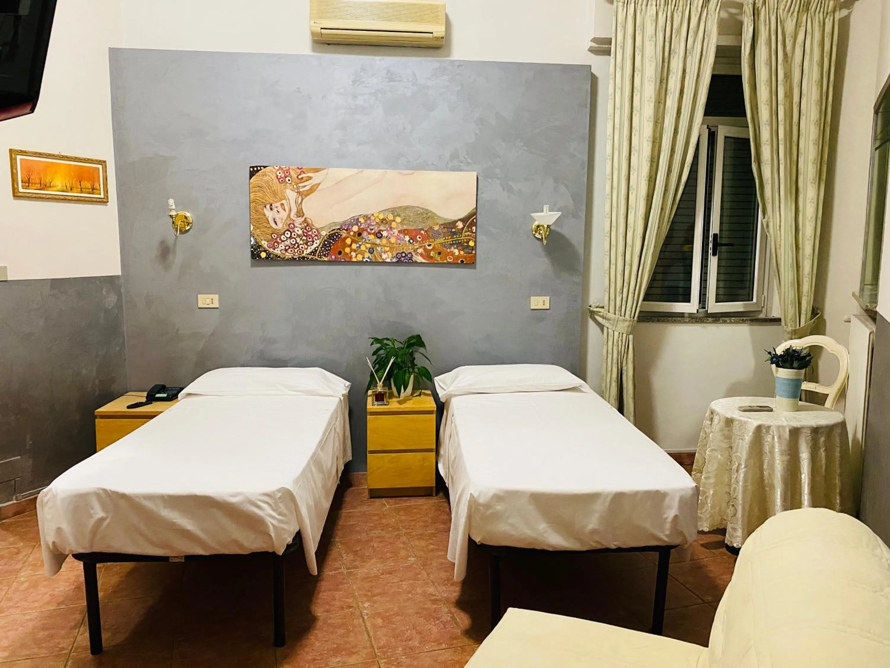 Bed in Hotel Ferrucci