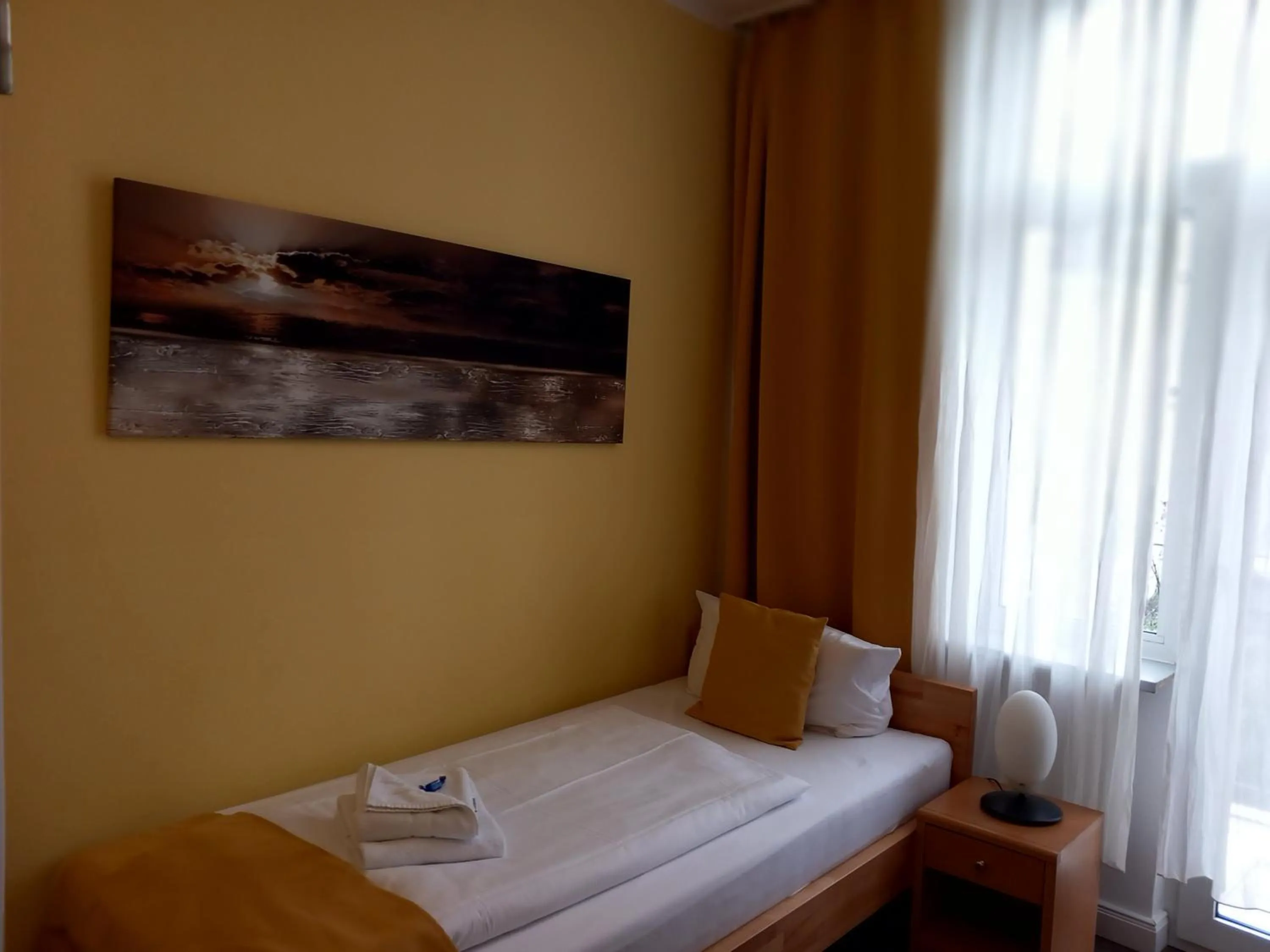 Bed in Hotel Karolinger - Self Check-In