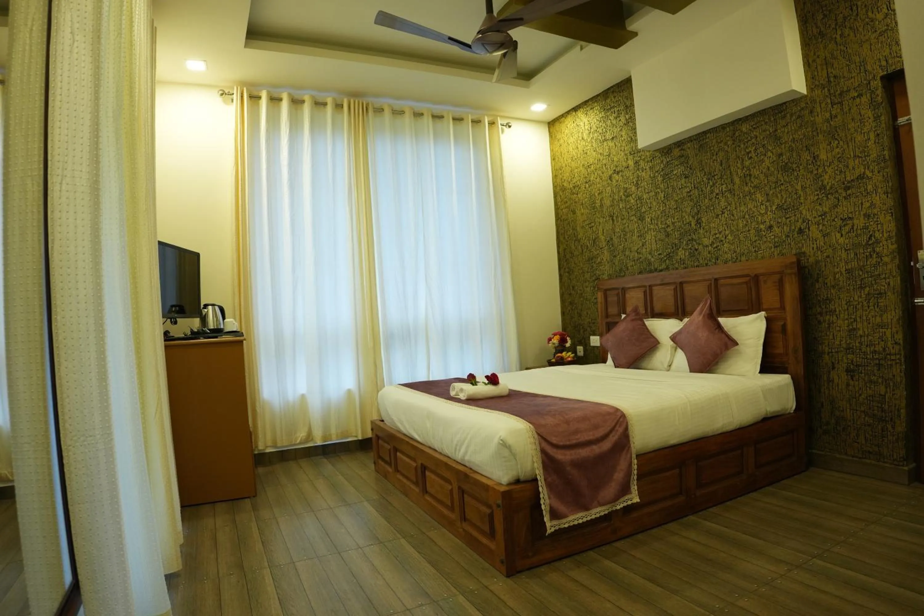 Communal lounge/ TV room, Bed in Vaga Mist Resort Vagamon