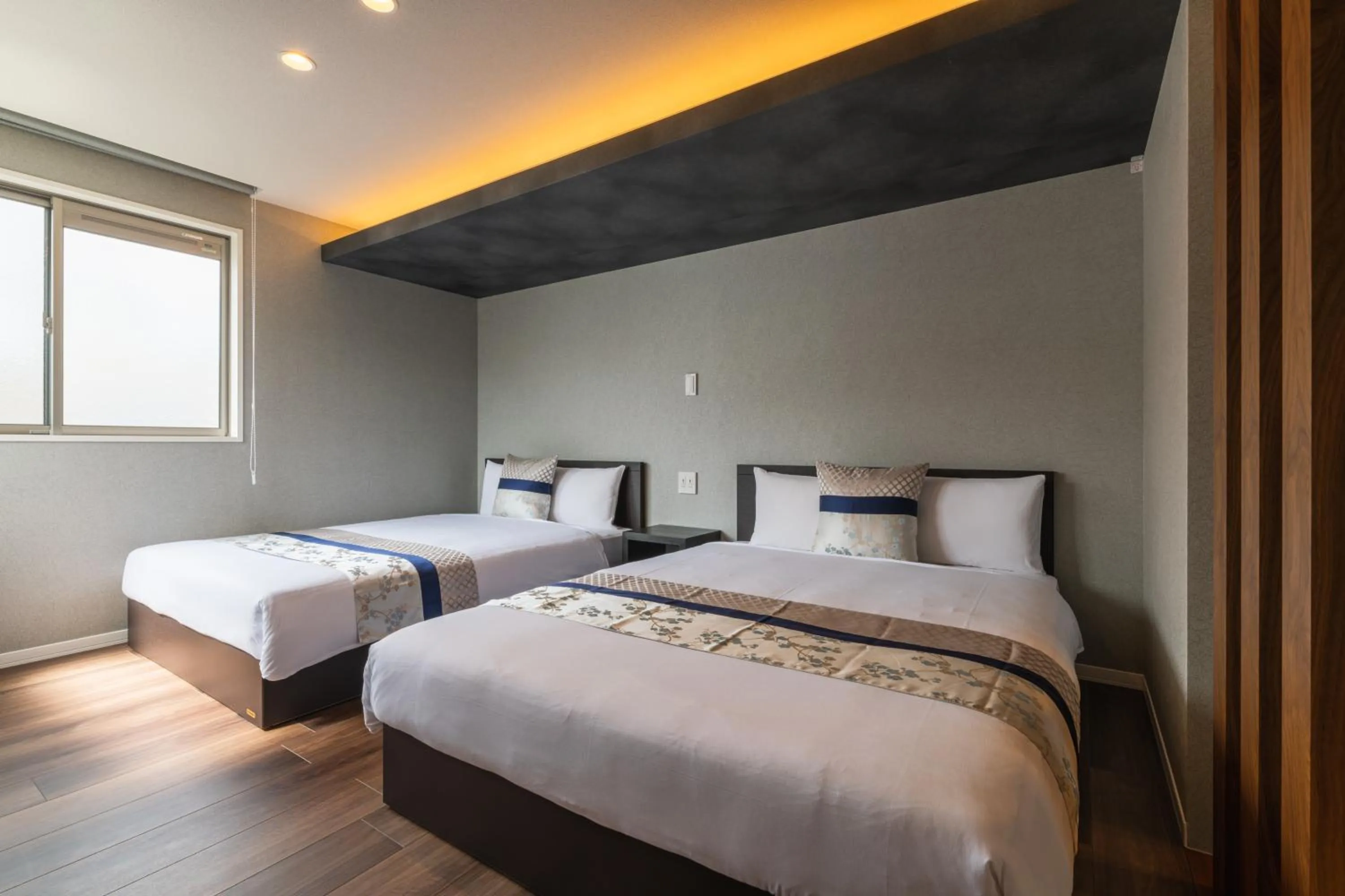 Bed in GRAND BASE Nagasaki Chukagai