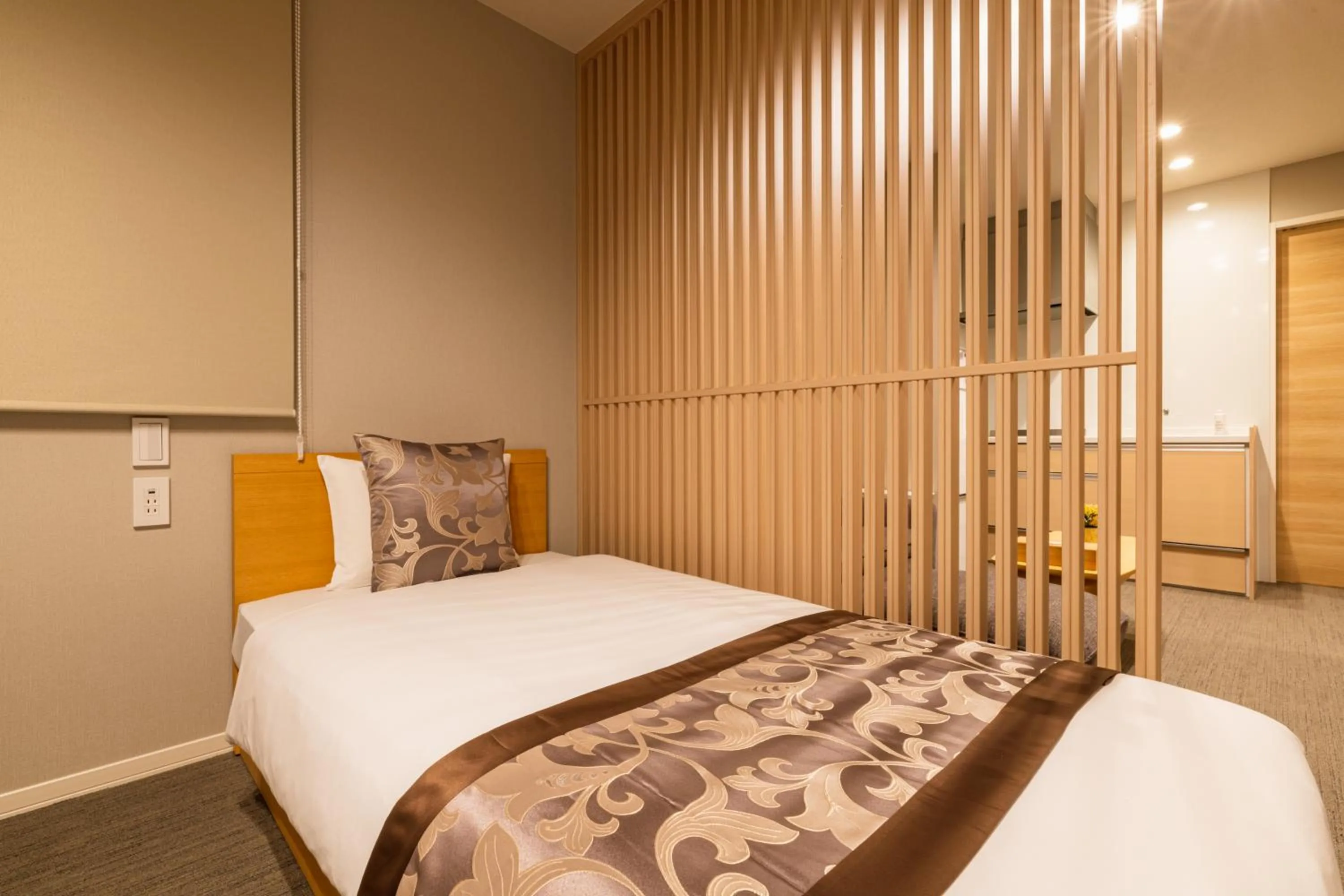 Bed in GRAND BASE Nagasaki Chukagai