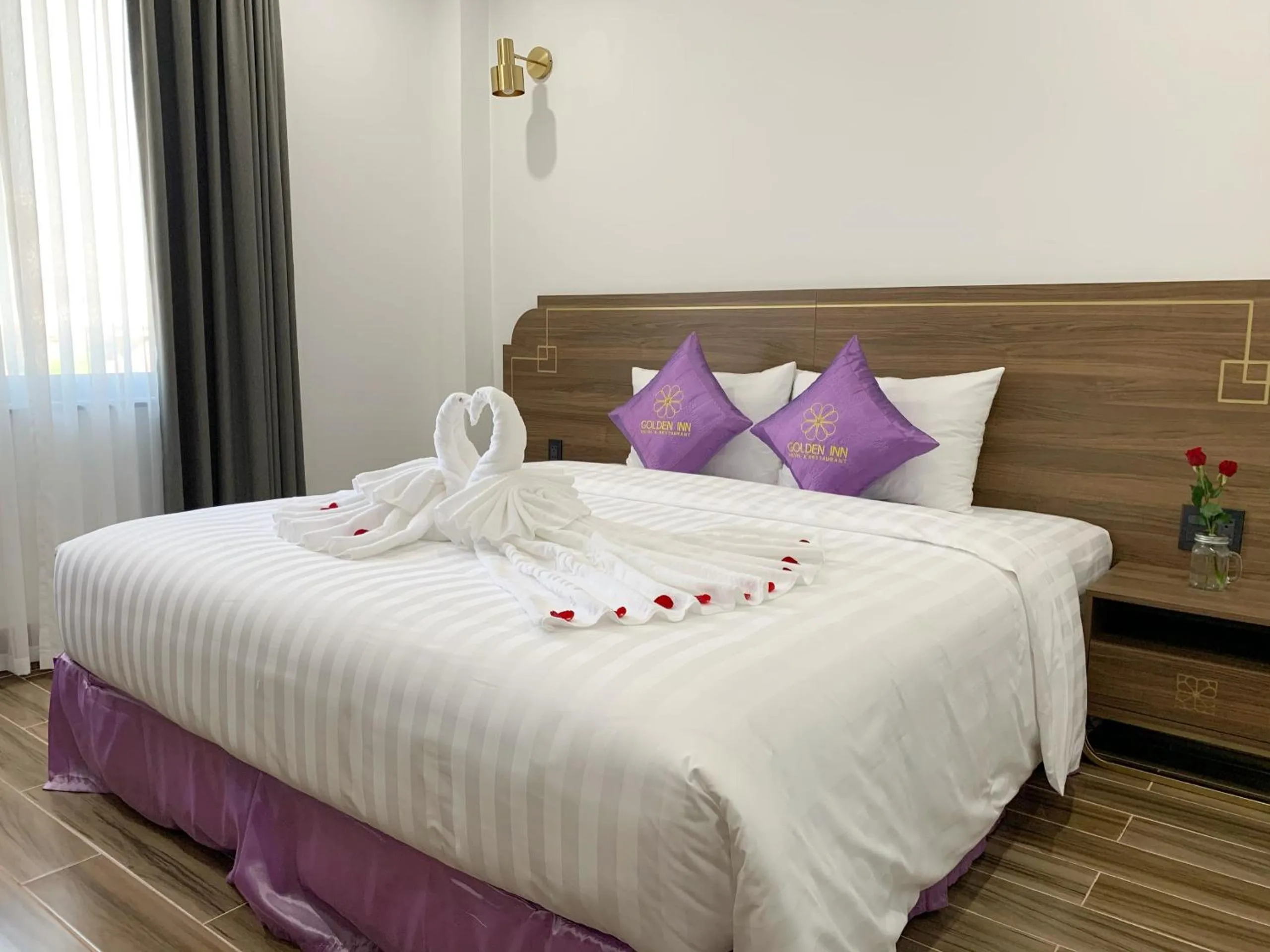 Bed in Golden Inn Hotel