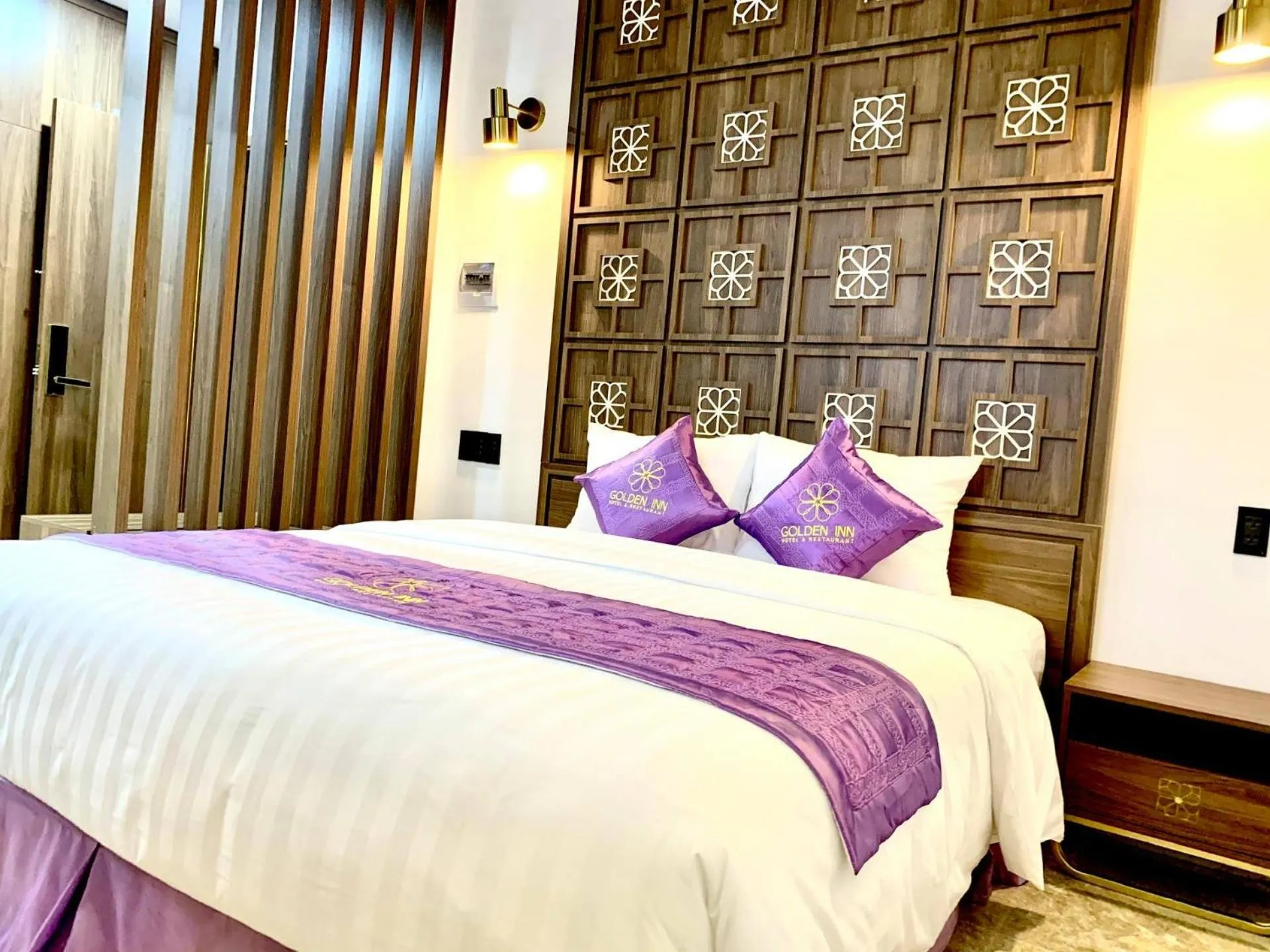 Bed in Golden Inn Hotel