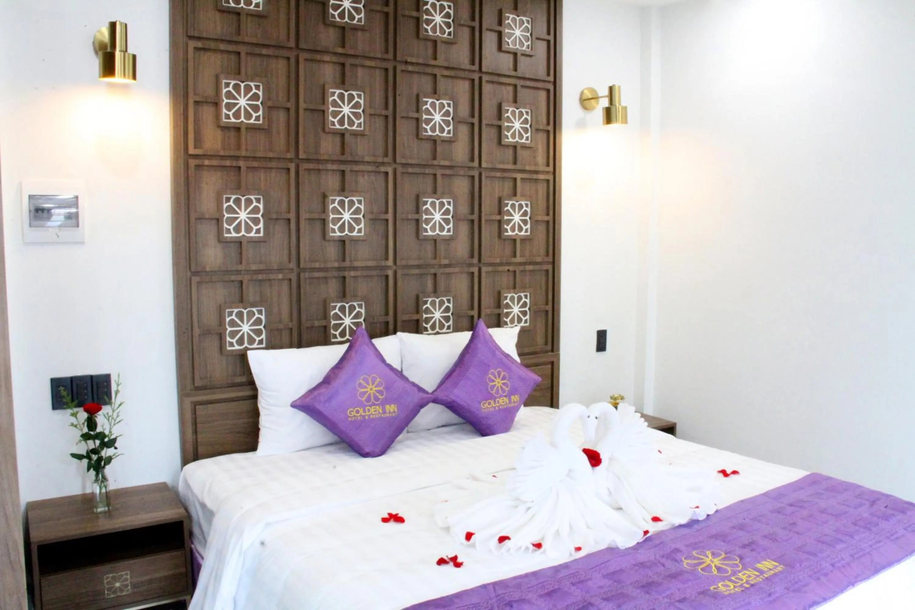 Bed in Golden Inn Hotel