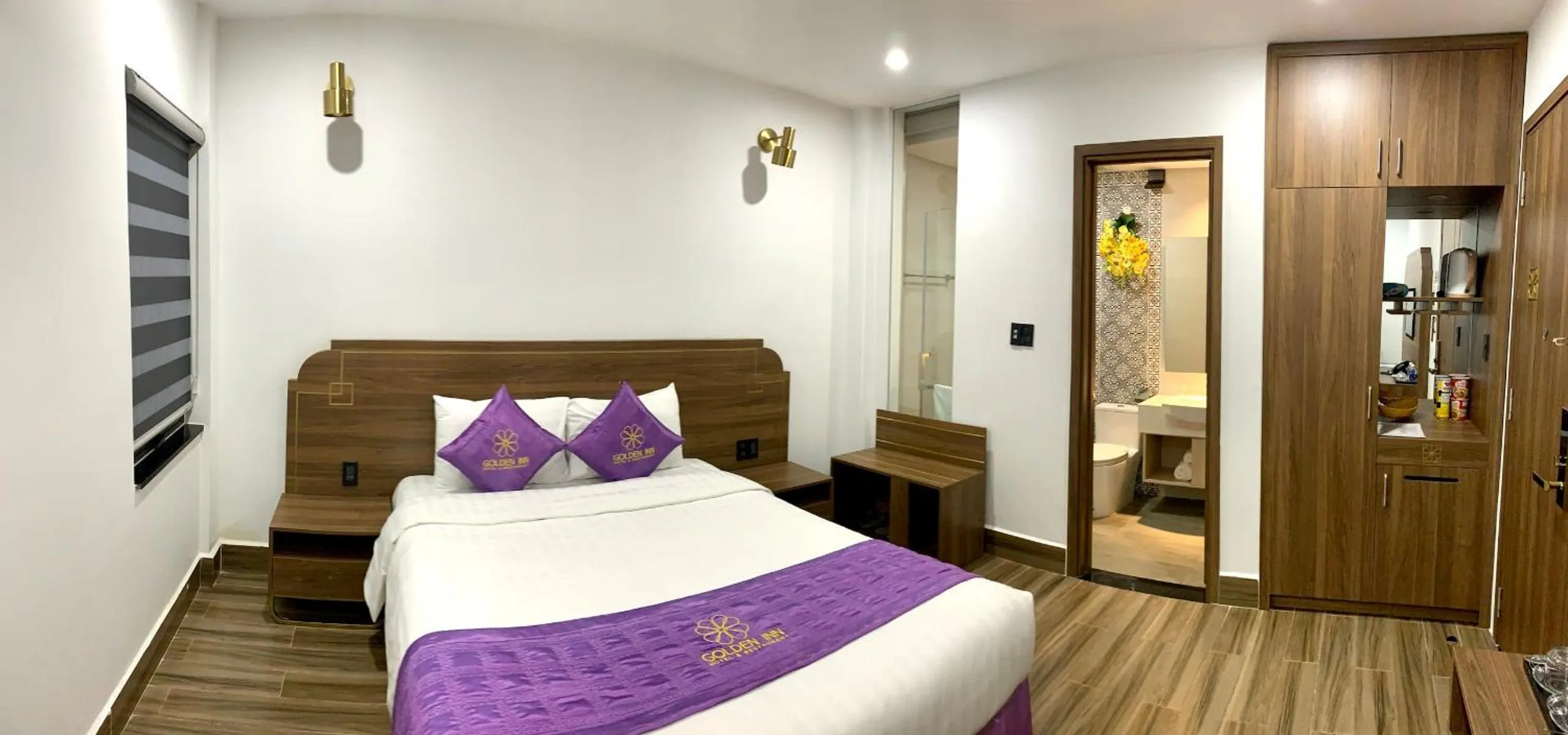 Bed in Golden Inn Hotel