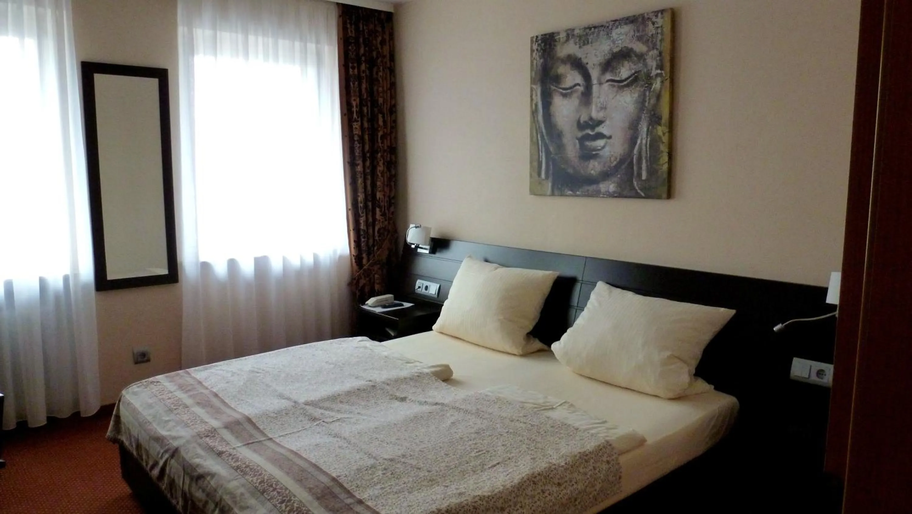 Bed in Hotel Rüdesheimer Hof