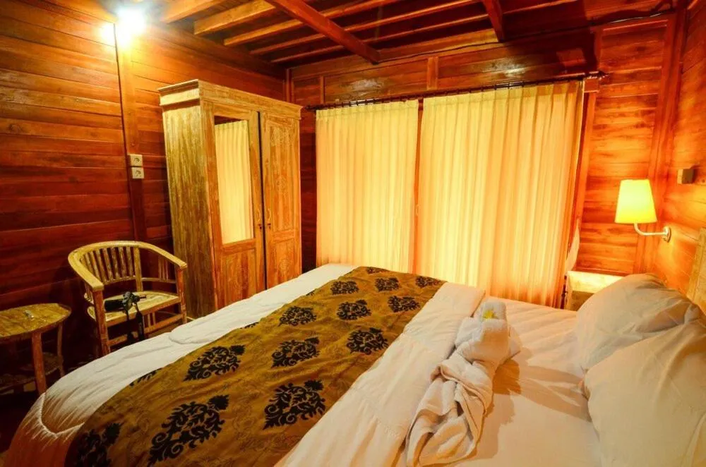Bed in Villa Kedisan Lakeview