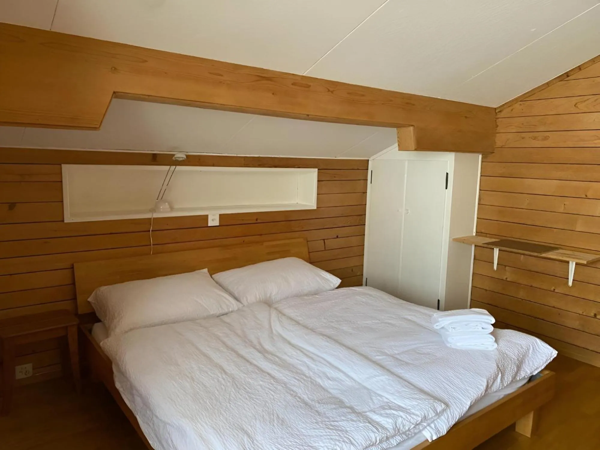 Bed in Berghaus Niederhorn