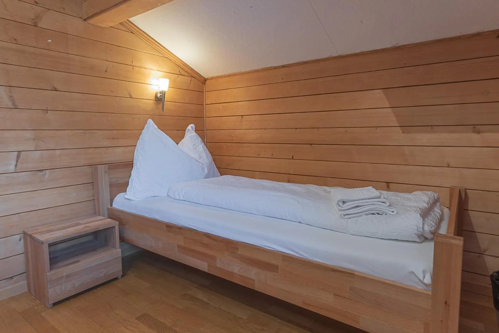 Bed in Berghaus Niederhorn