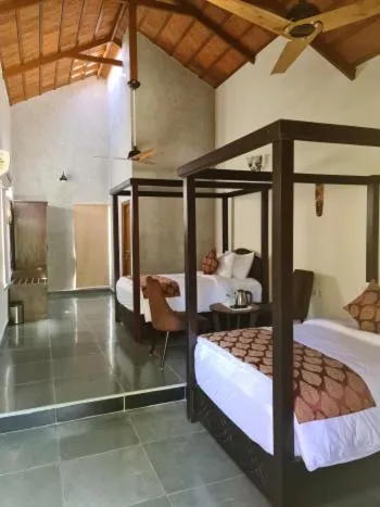 Bedroom, Bed in Brown Town Resort & Spa