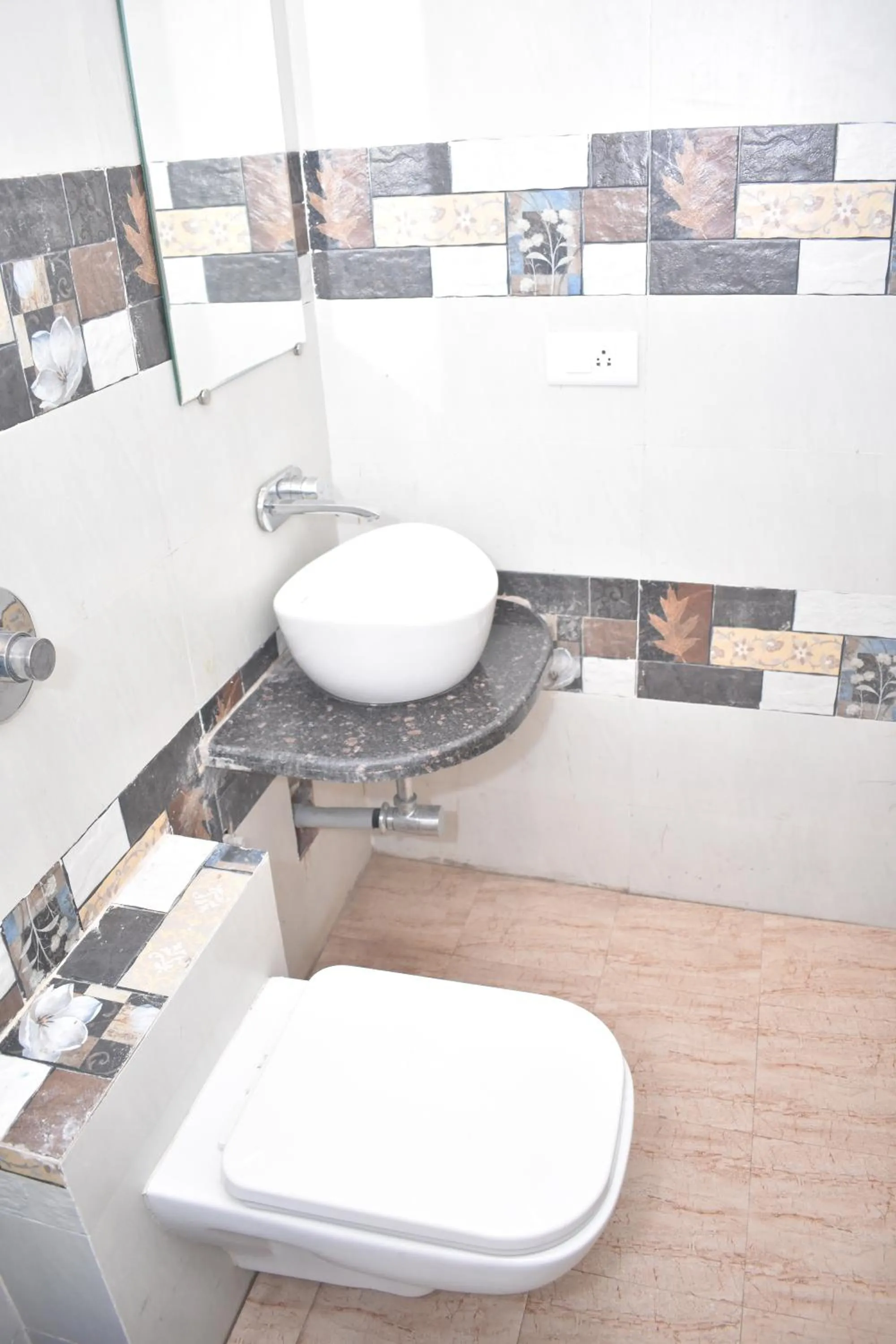 Toilet in HOTEL UMA PALACE