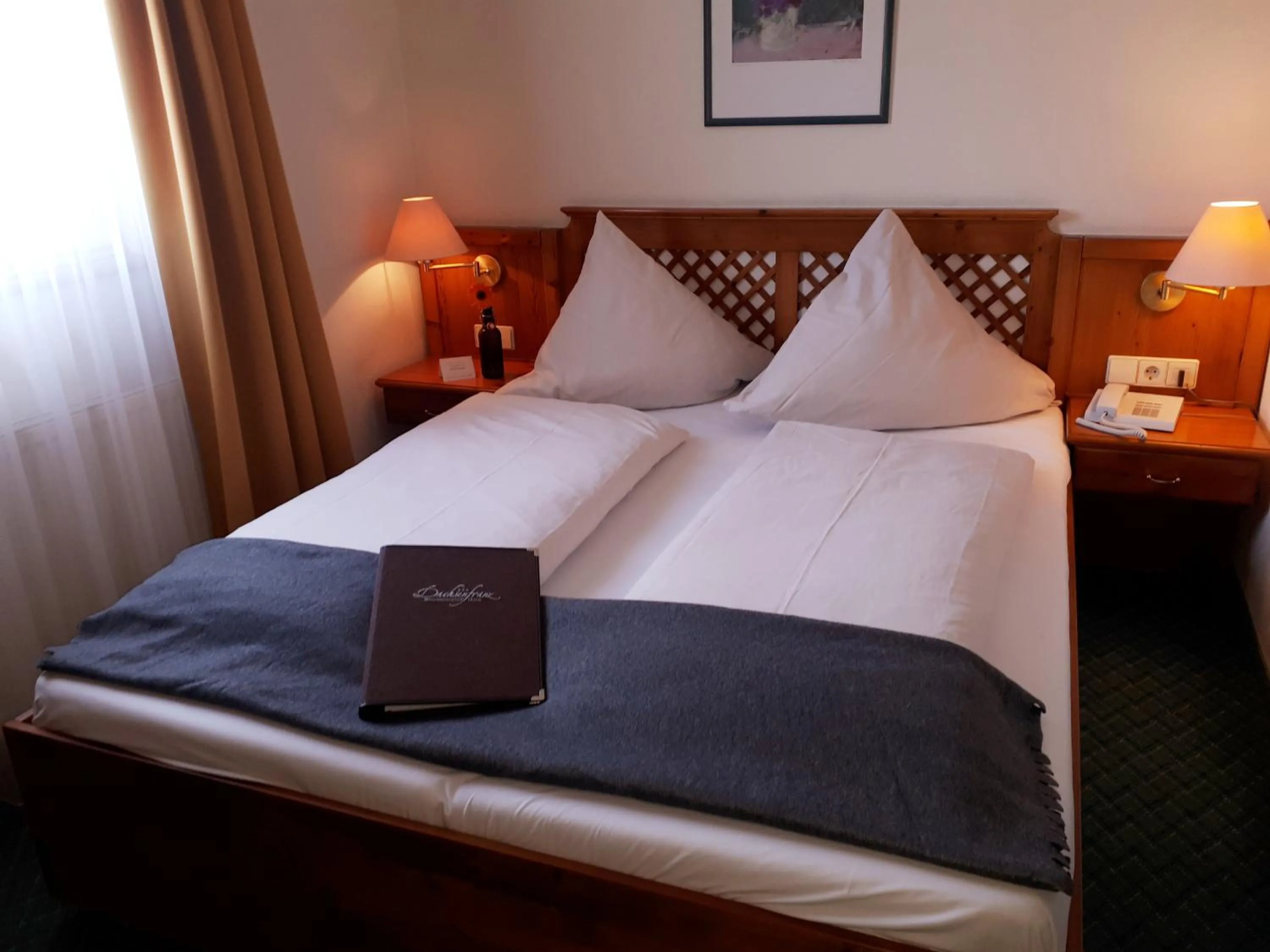 Bed in Brauereigasthof Dachsenfranz