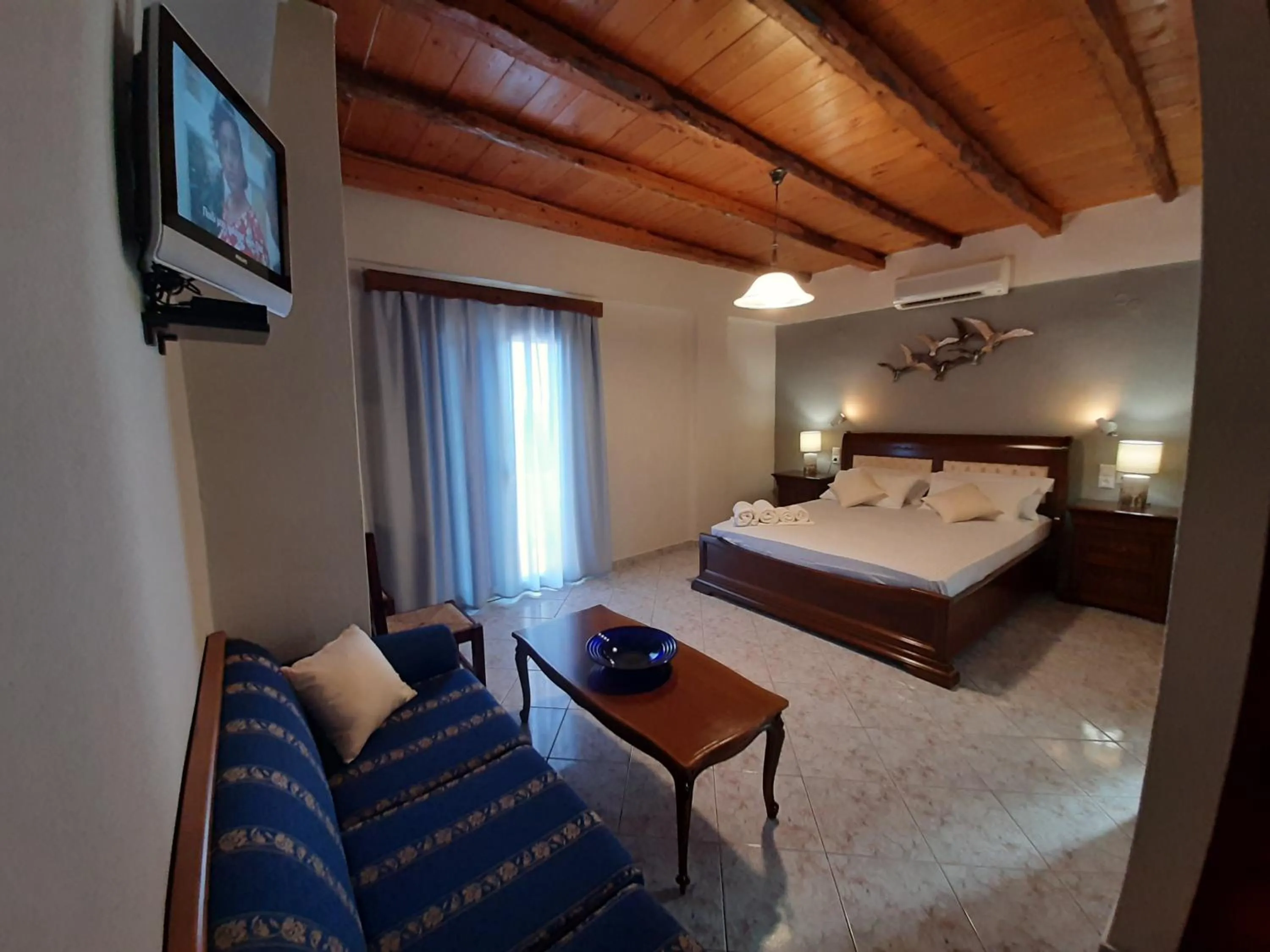 Photo of the whole room, Bed in Agia Roumeli Hotel adults only
