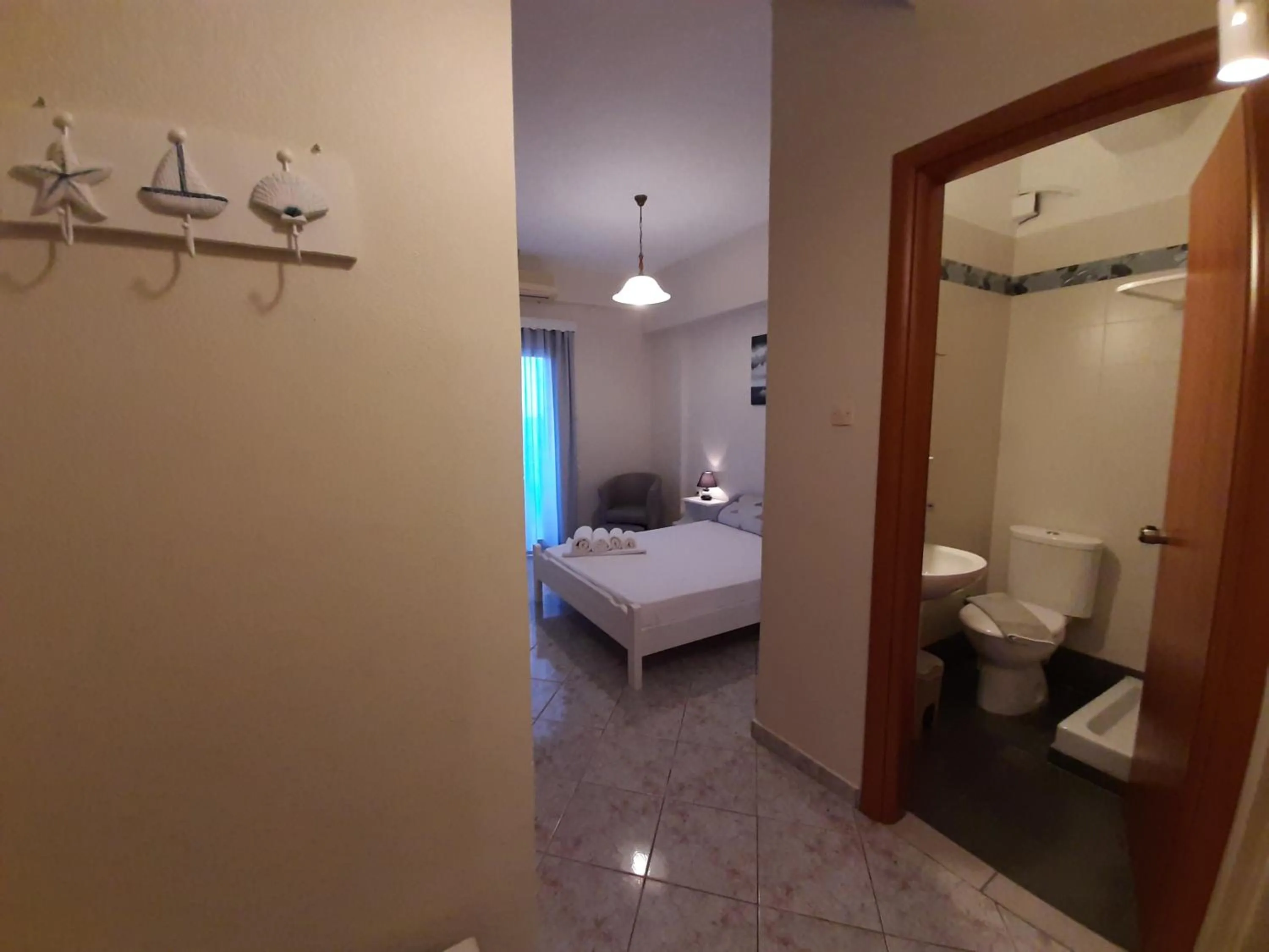 Photo of the whole room, Bed in Agia Roumeli Hotel adults only