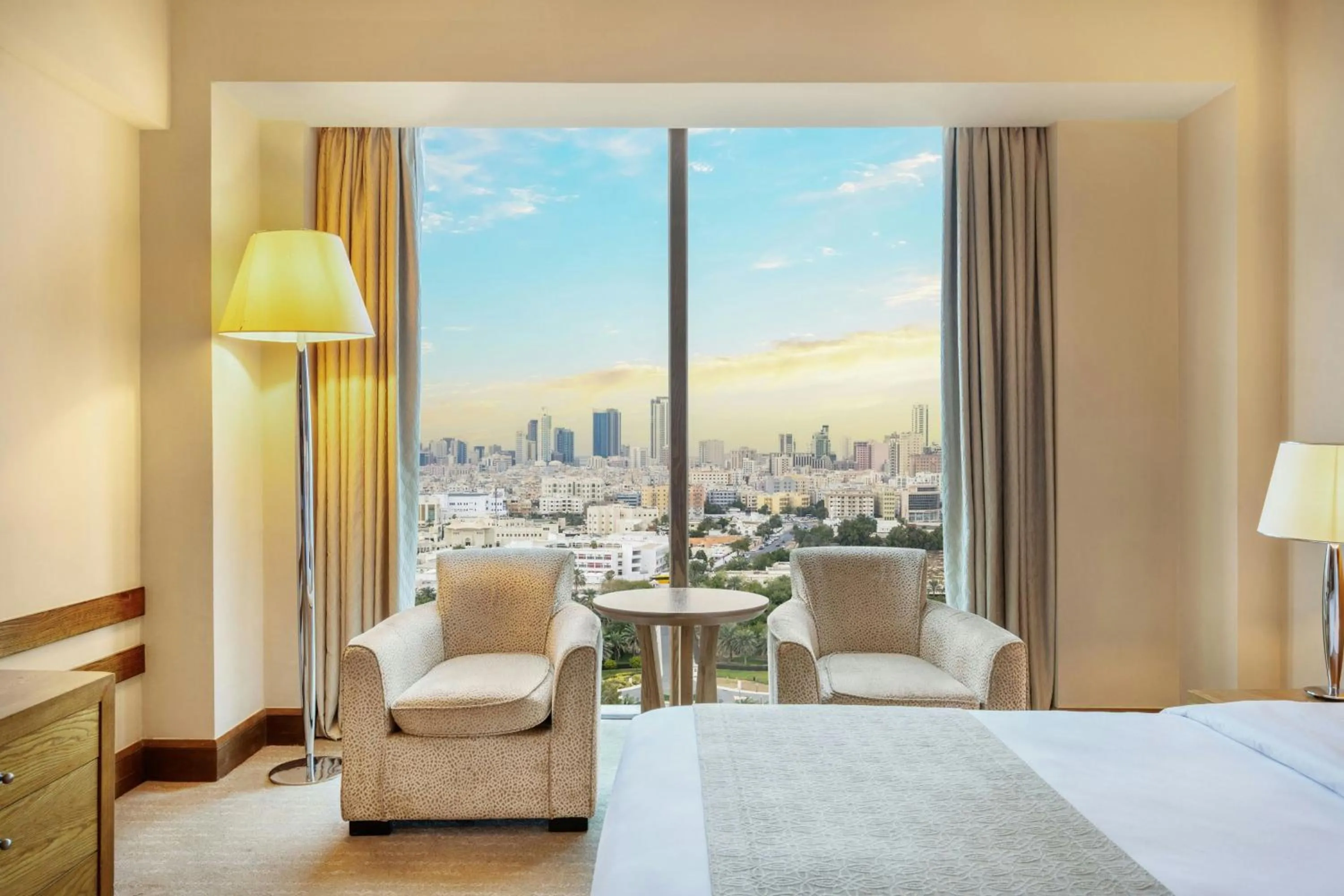 Photo of the whole room, Bed in Gulf Hotel Bahrain Convention and SPA