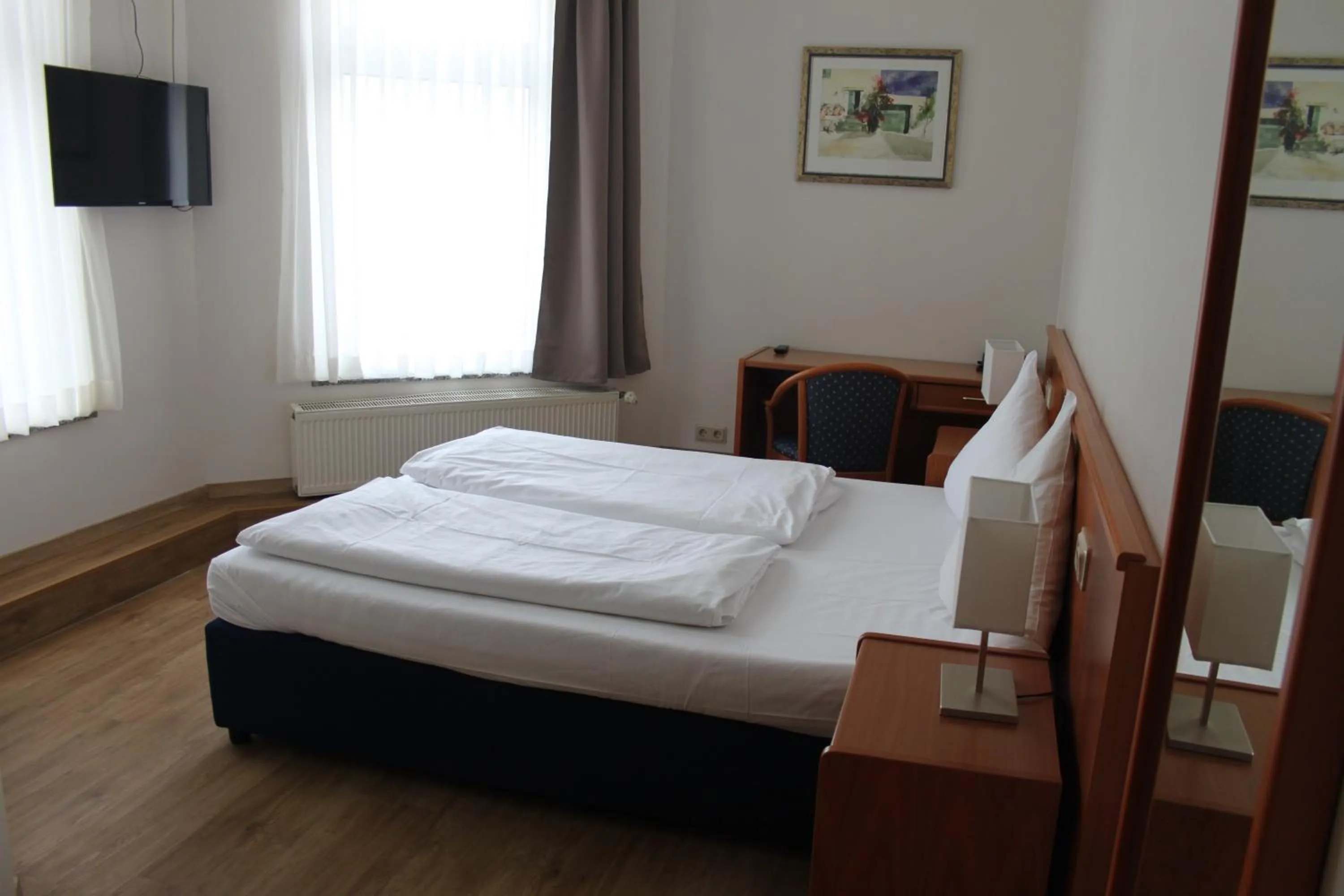 Photo of the whole room, Bed in Stadt-Gut-Hotel Zum Rathaus