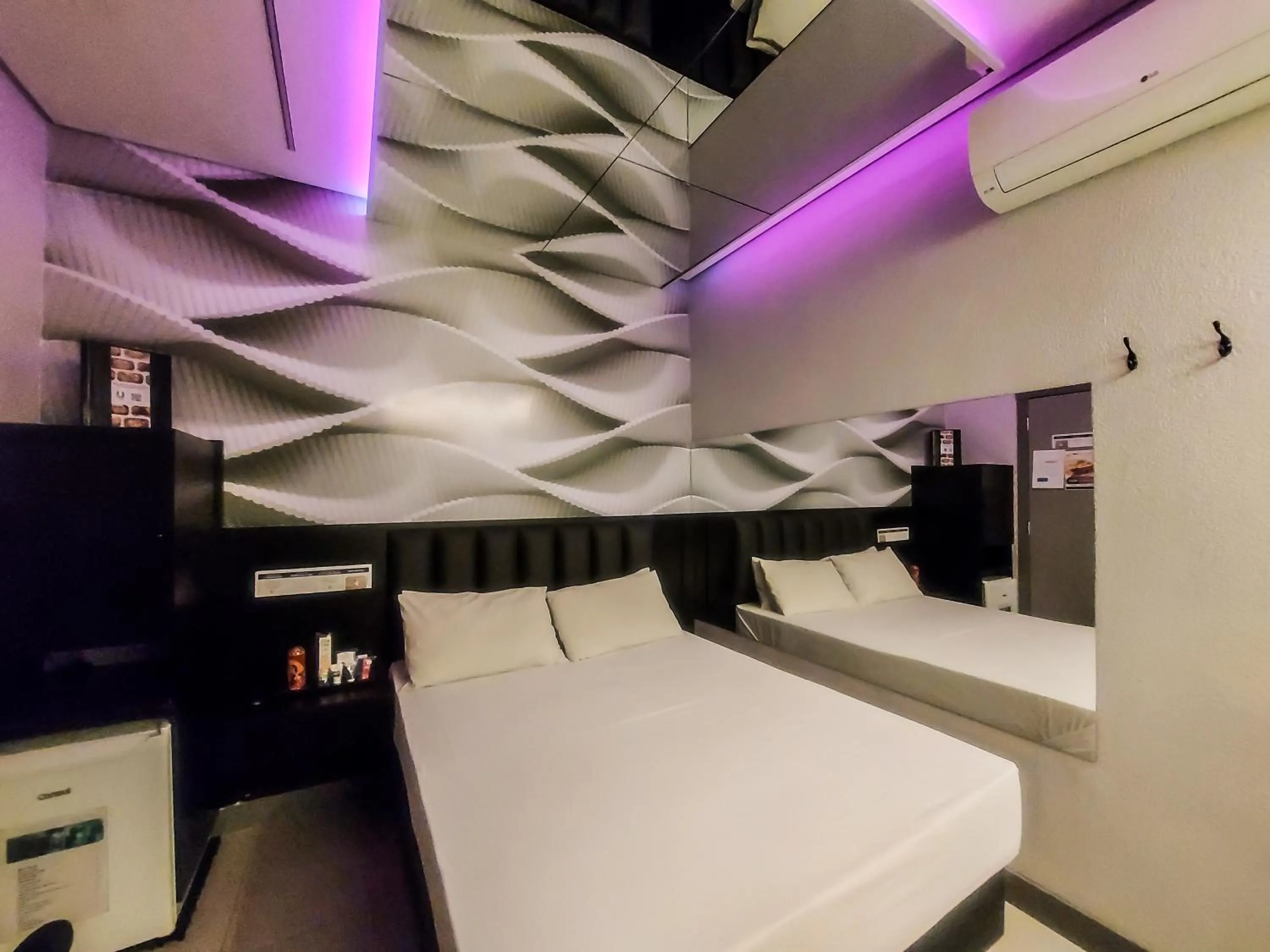 Bed in Único Motel Faria Lima