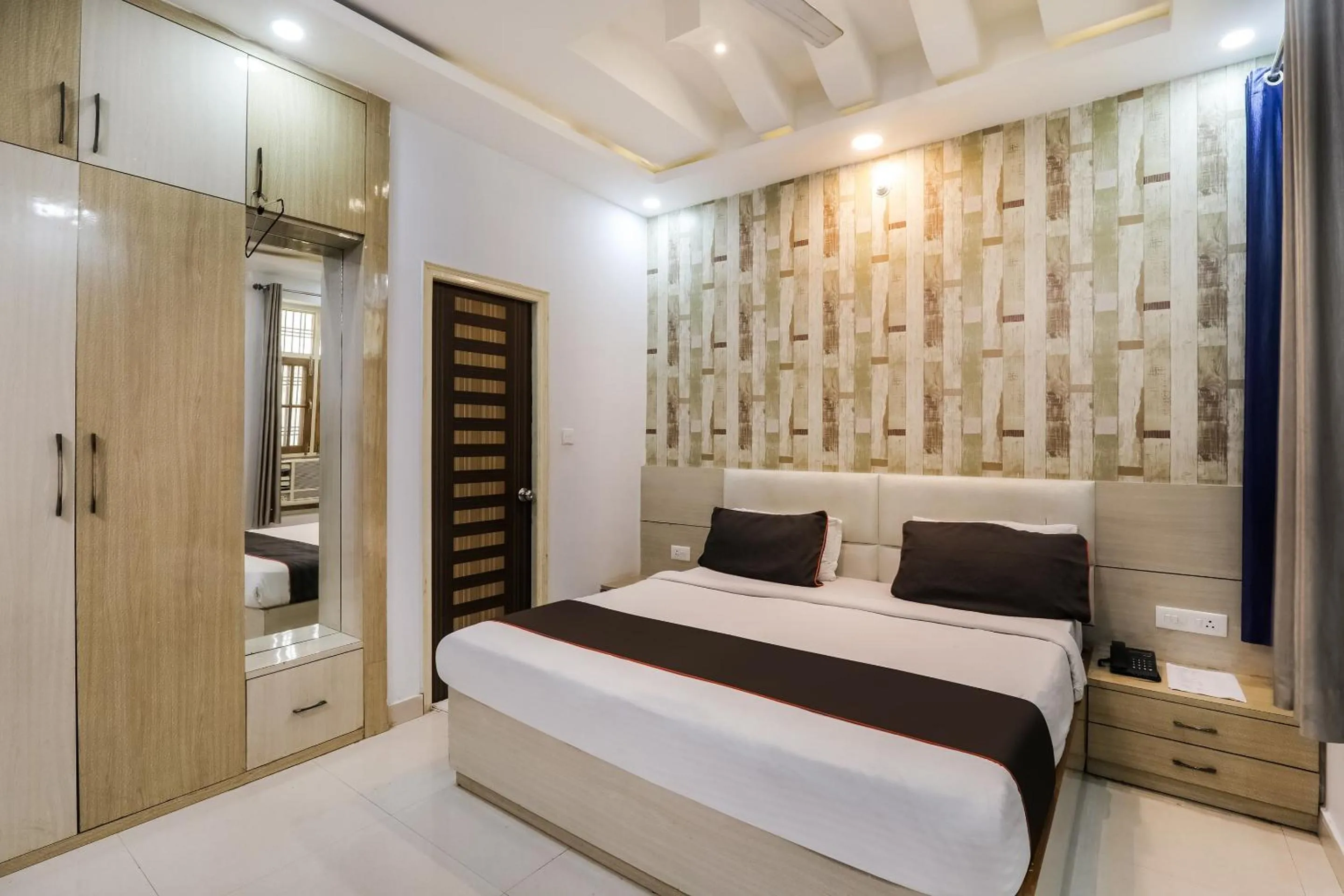 Bedroom, Bed in Super OYO Hotel O Kiara Inn
