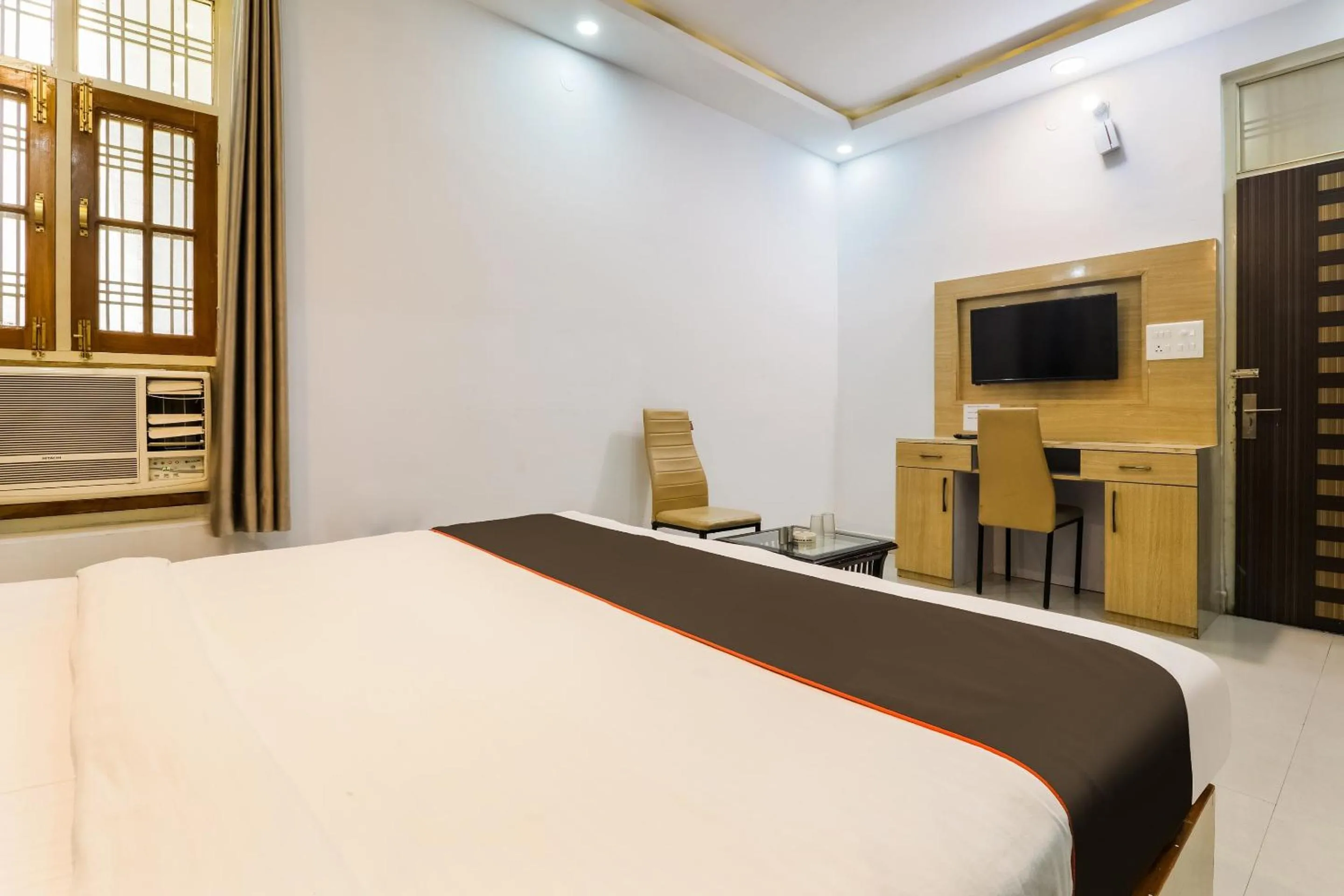 Bedroom, Bed in Super OYO Hotel O Kiara Inn