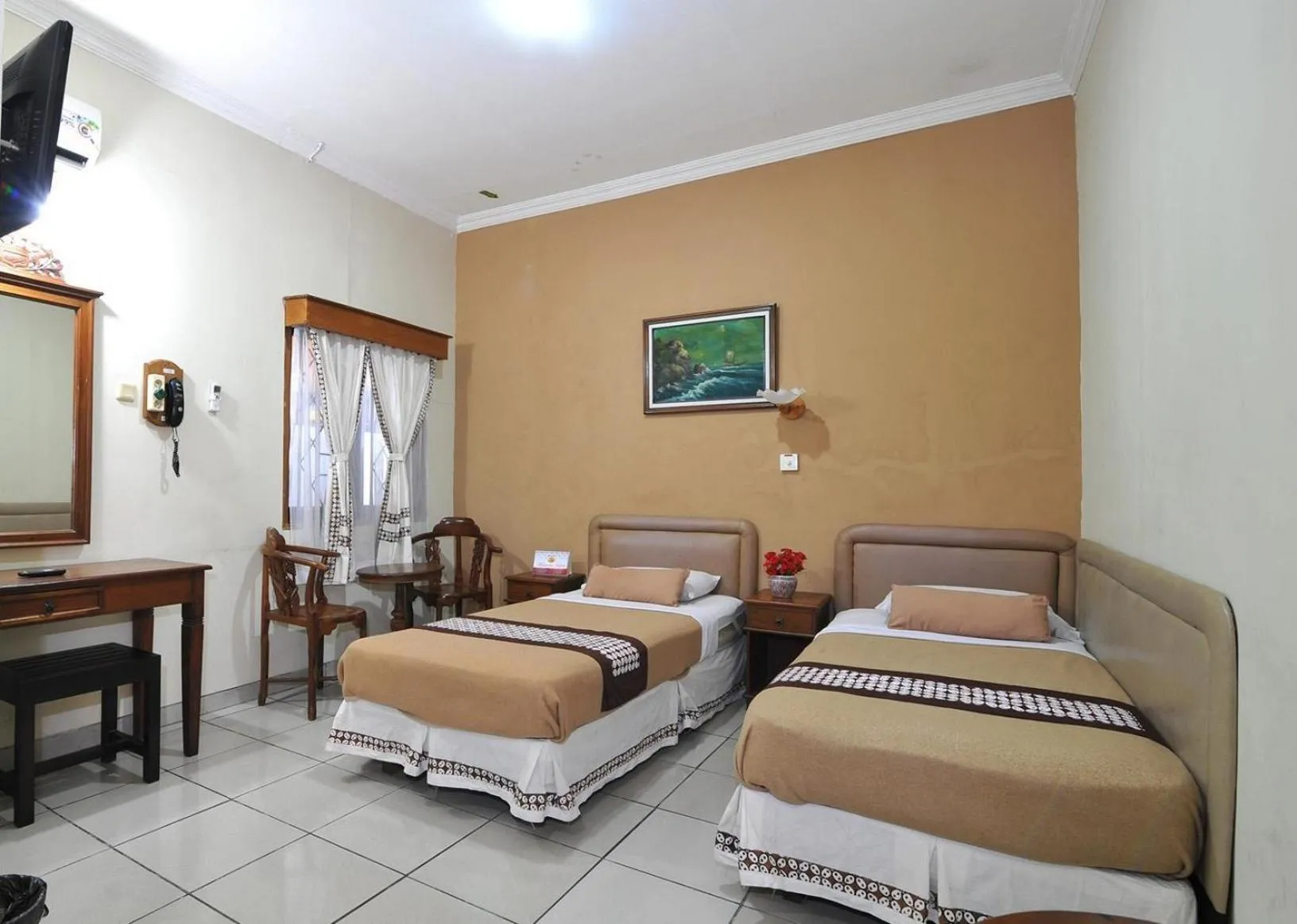 Bed in Hotel Mataram Malioboro