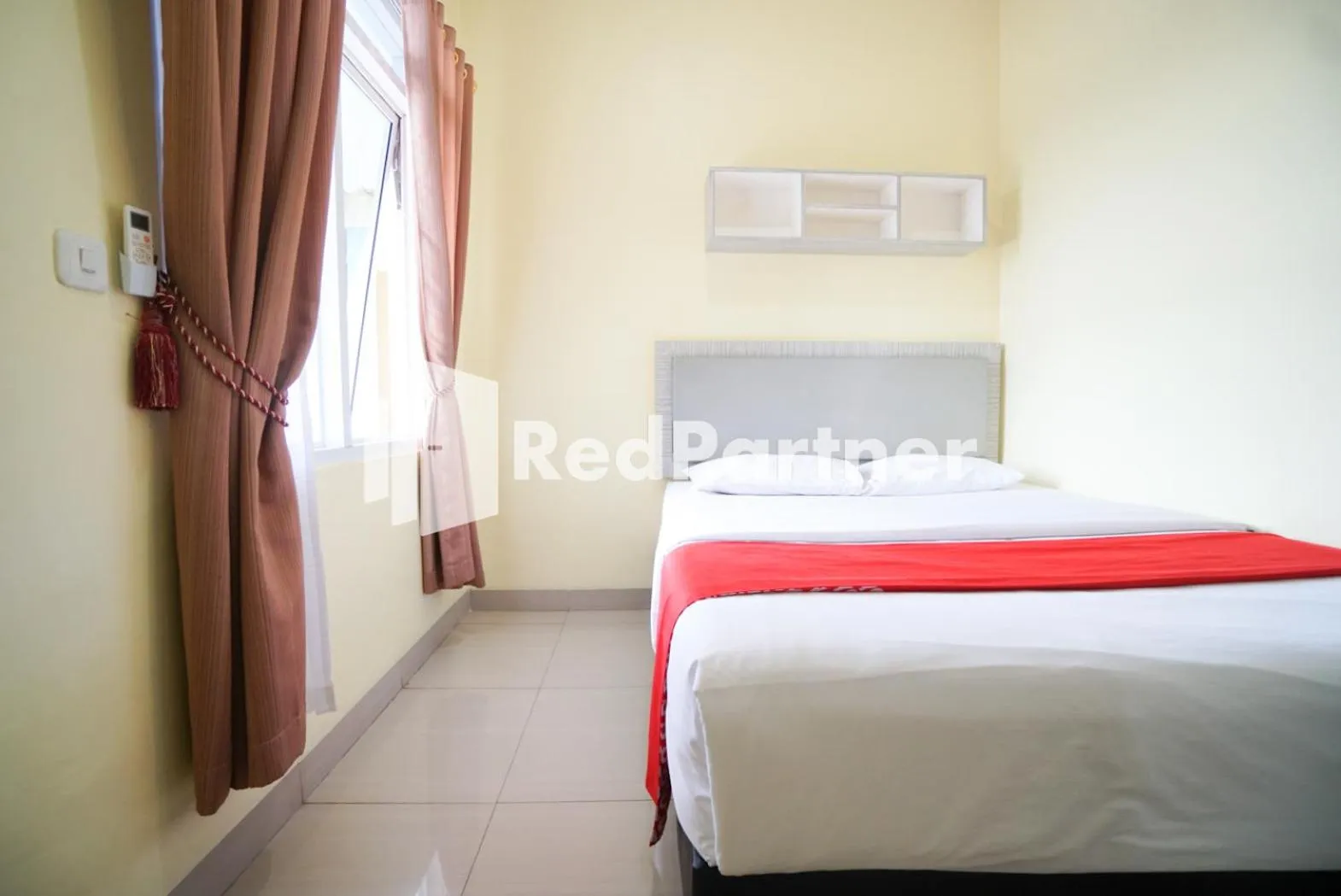 Bed in Indah Residence Syariah Mitra RedDoorz