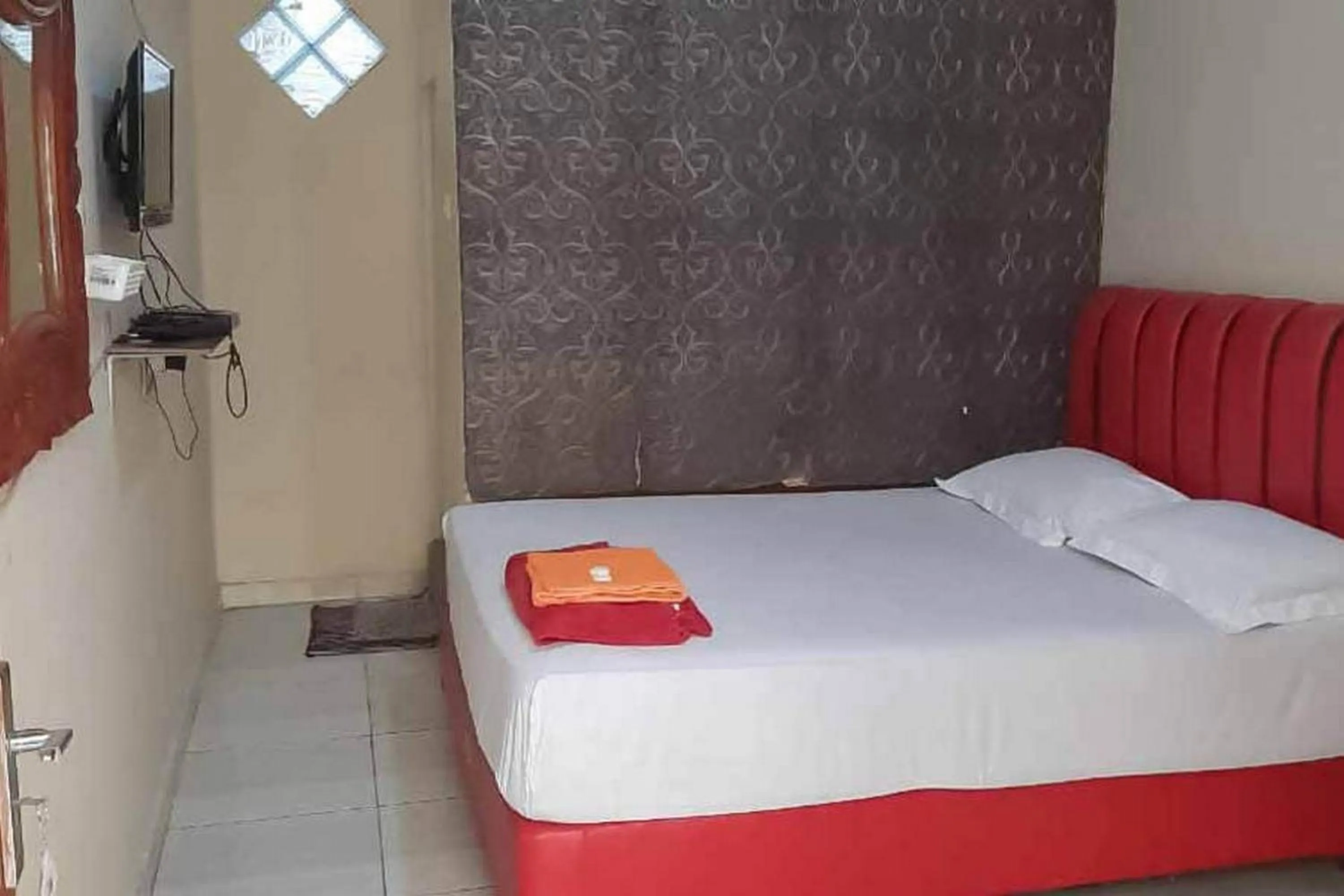 Bedroom, Bed in Pakansari Guest Inn Mitra RedDoorz