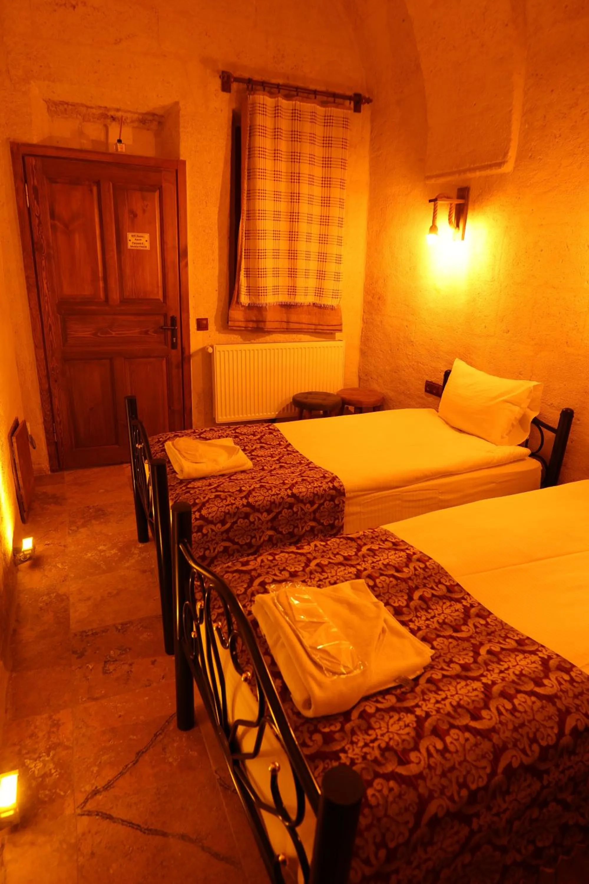 Photo of the whole room, Bed in Zanta Suite Hotel