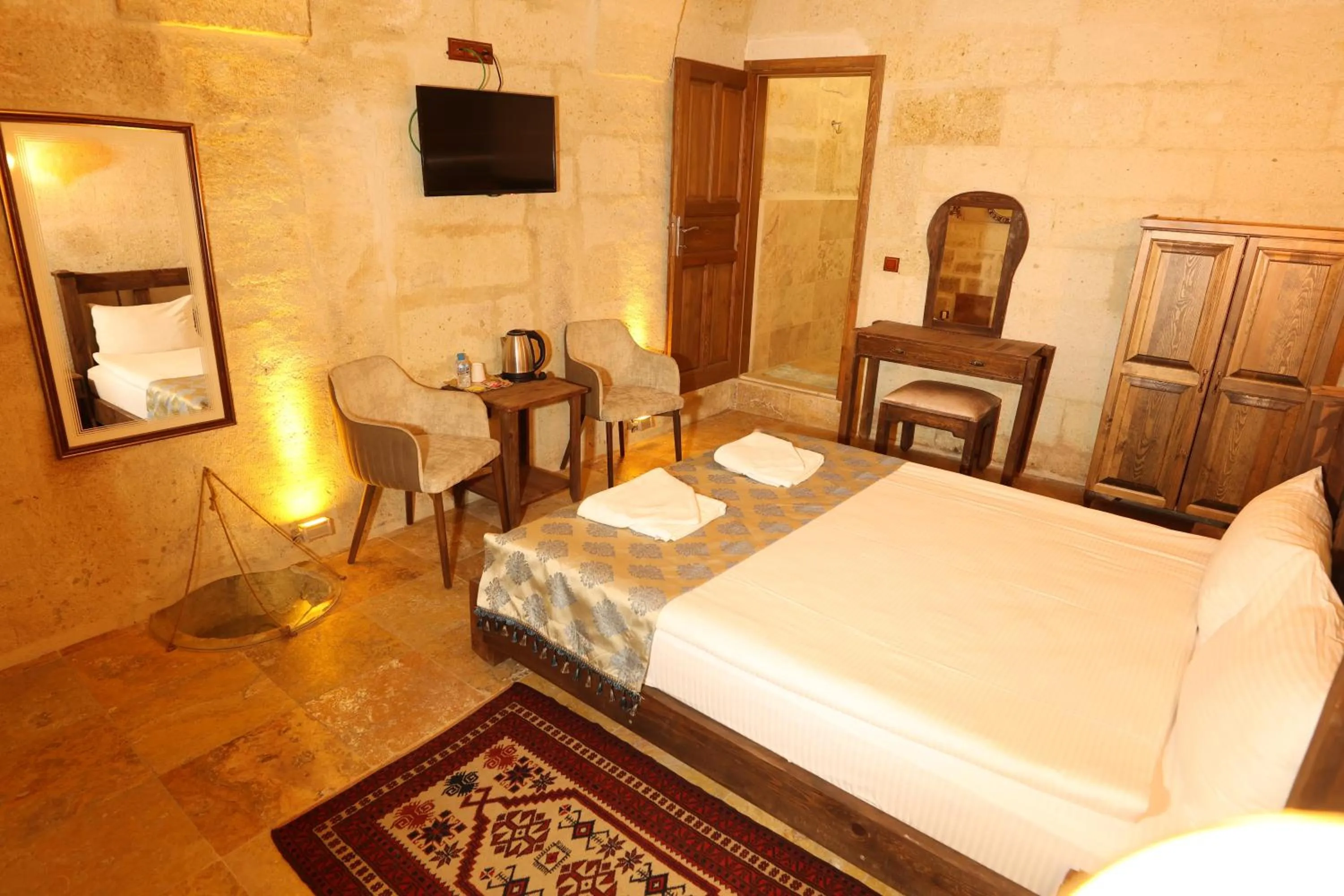 Bed in Zanta Suite Hotel