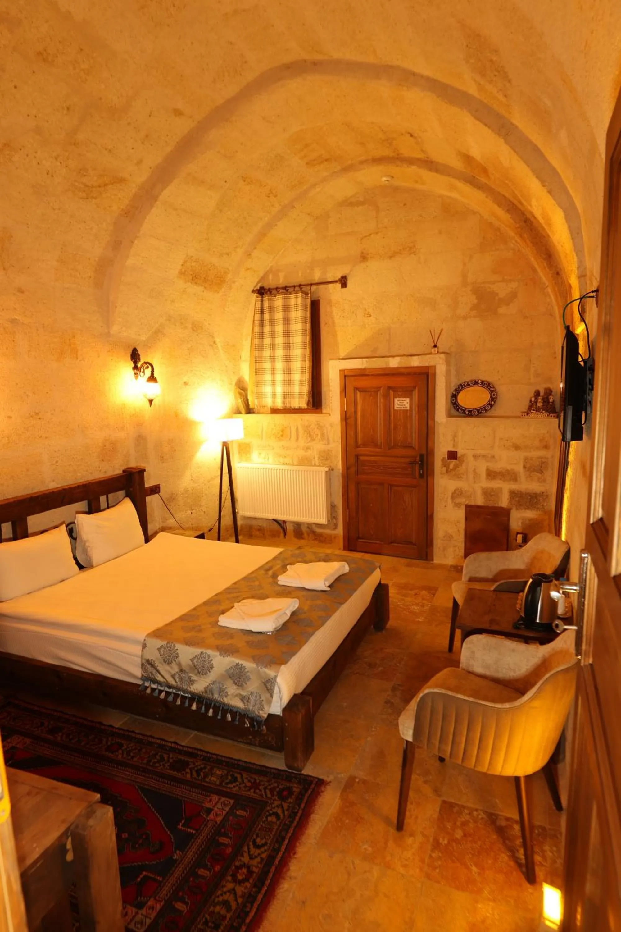 Bed in Zanta Suite Hotel