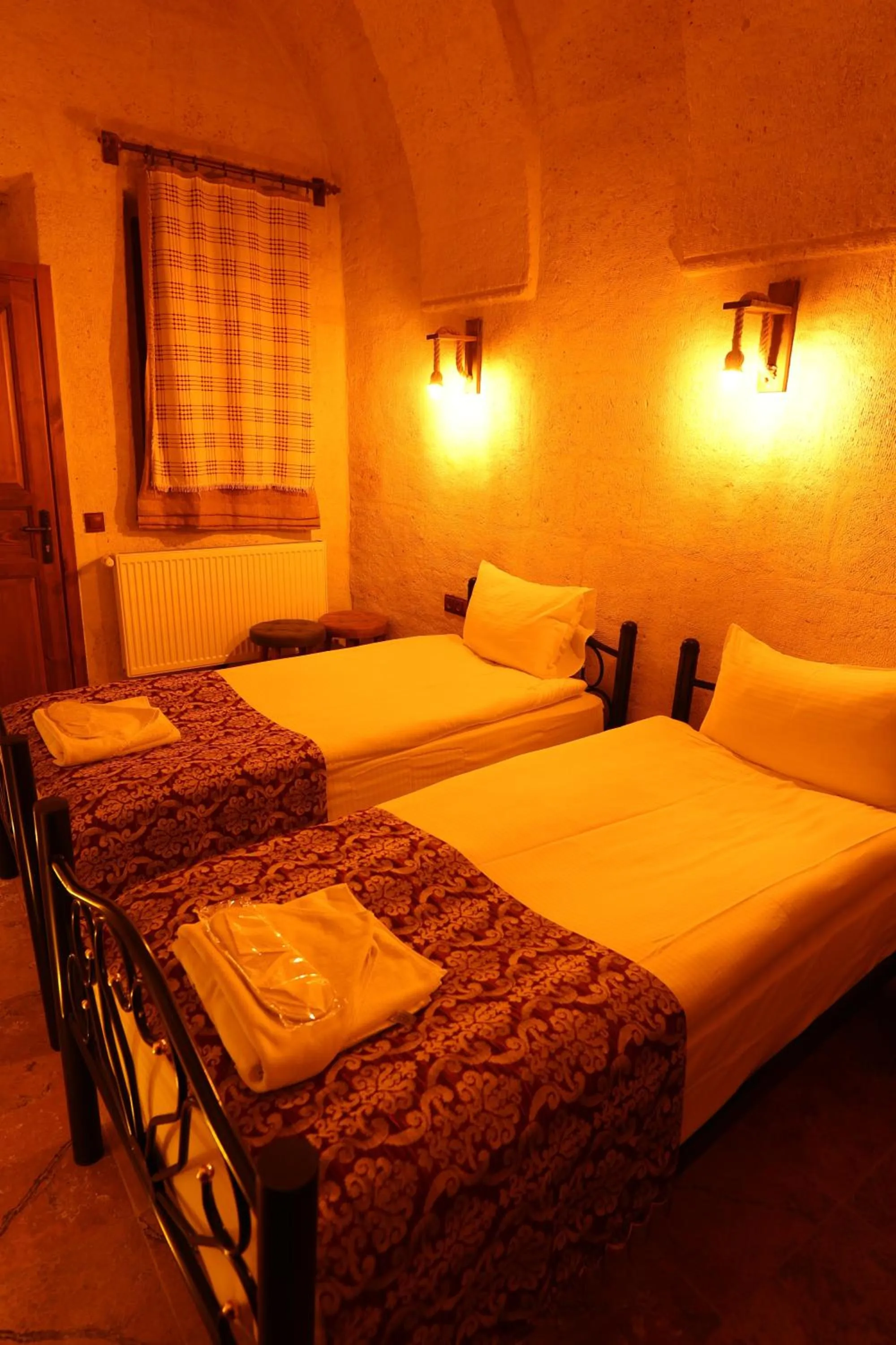 Photo of the whole room, Bed in Zanta Suite Hotel