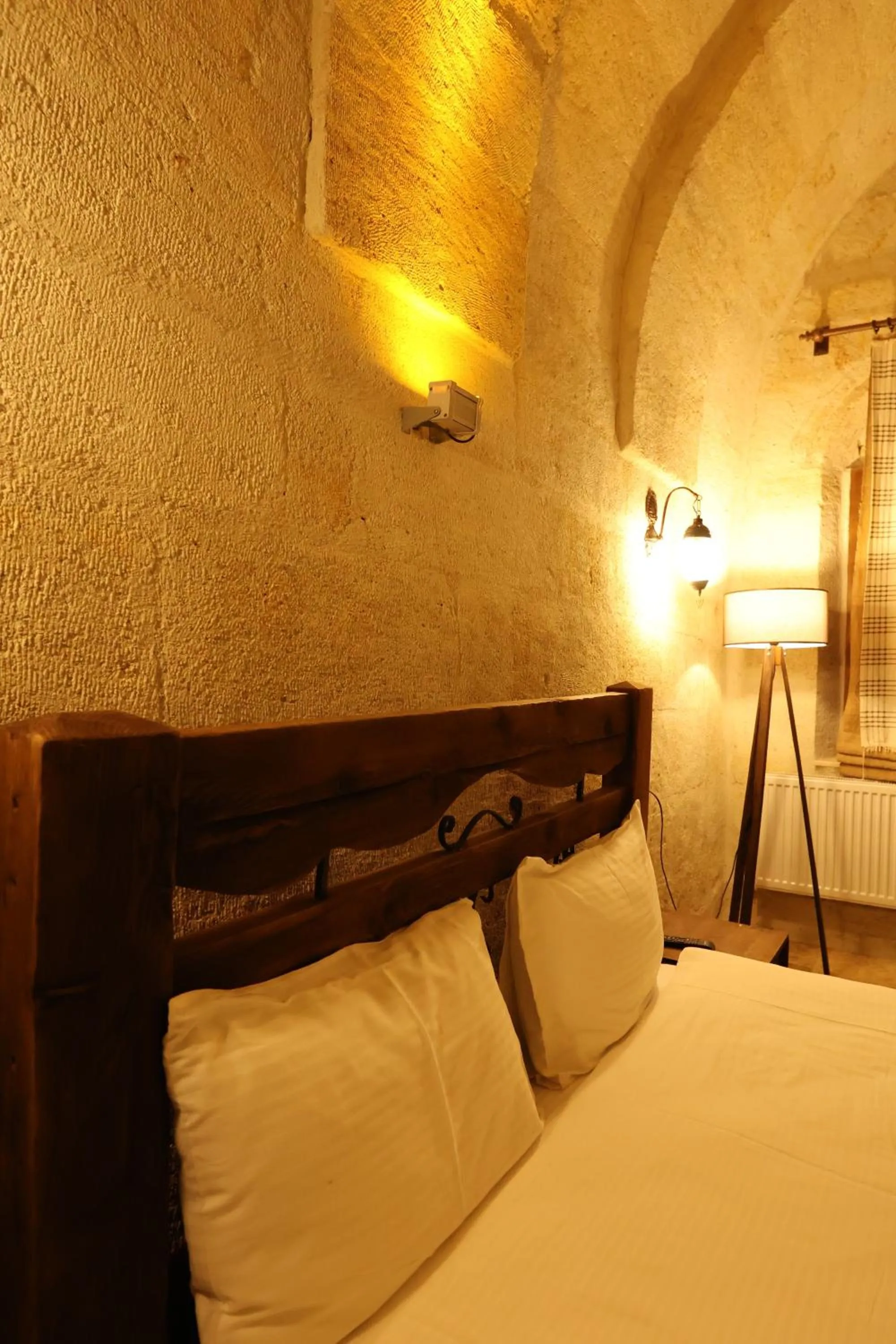 Bed in Zanta Suite Hotel