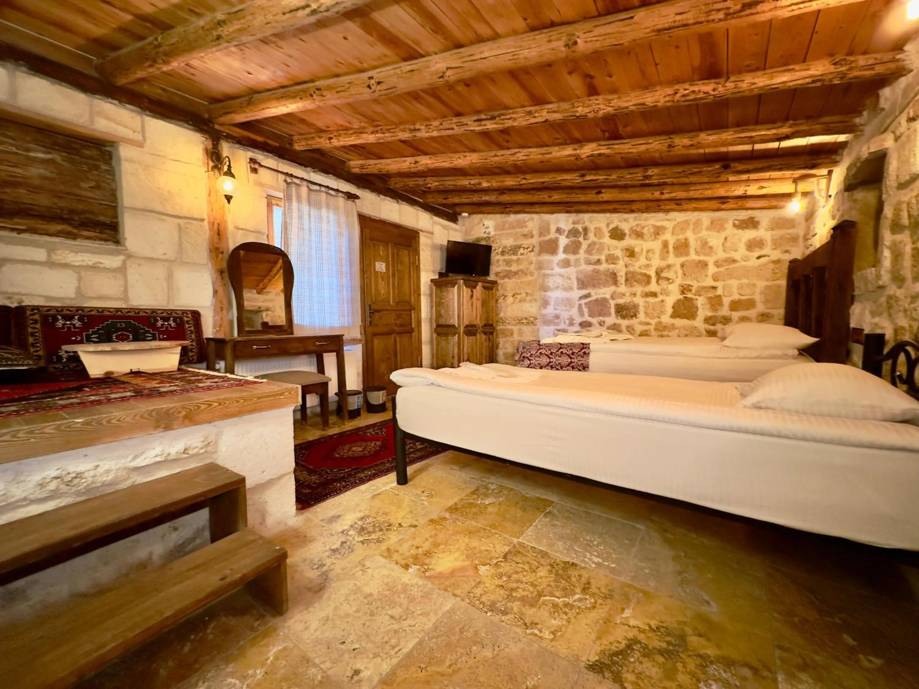 Living room, Bed in Zanta Suite Hotel