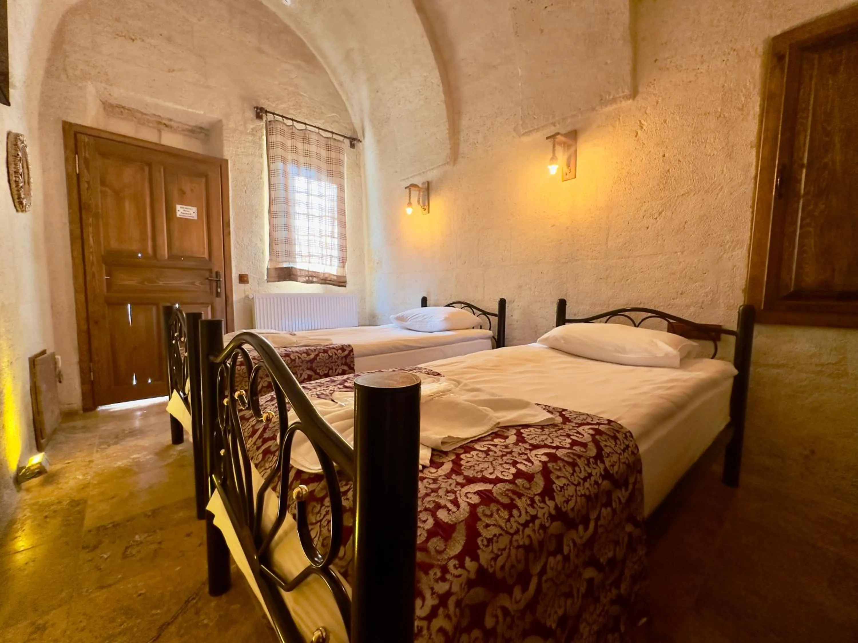 Photo of the whole room, Bed in Zanta Suite Hotel