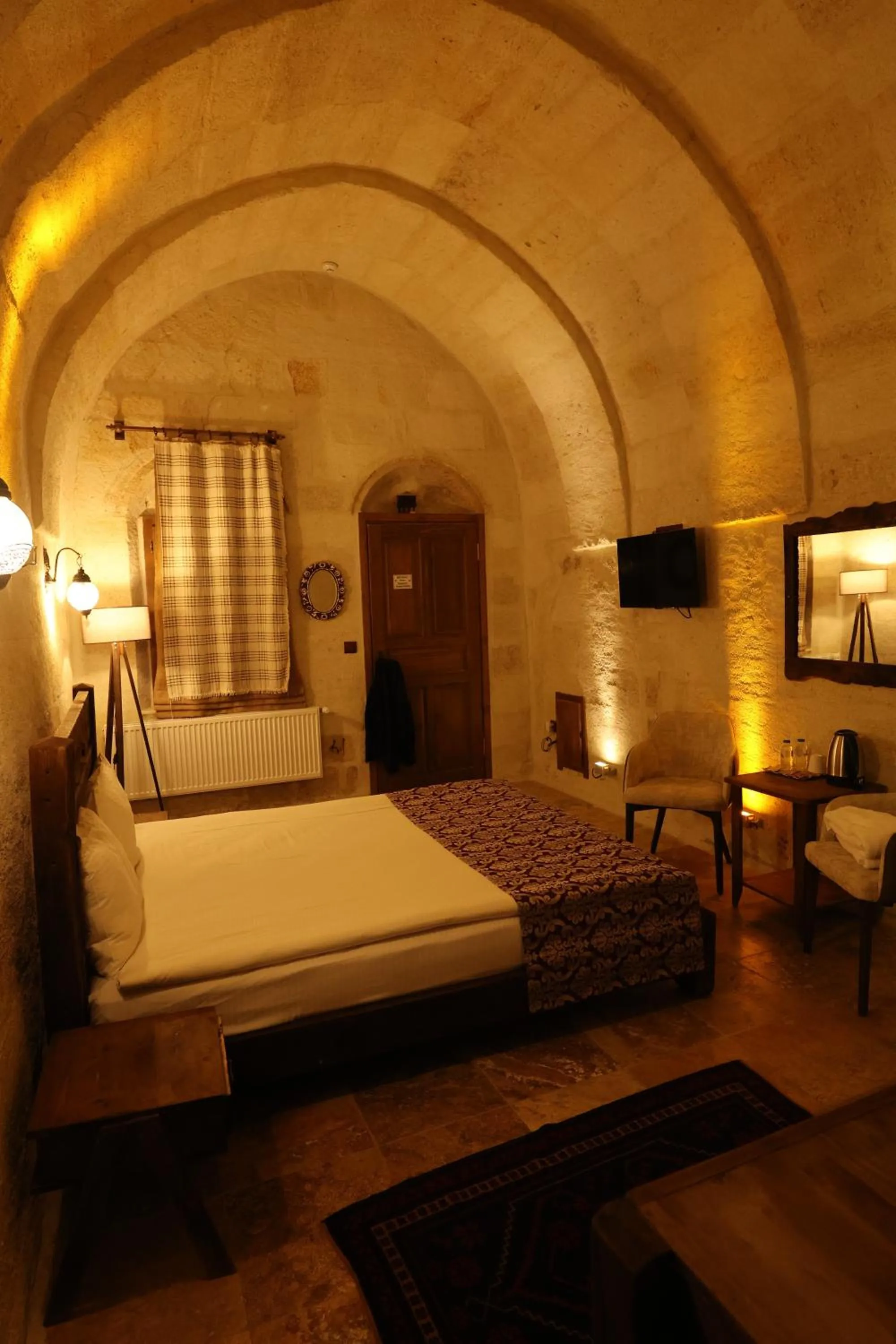 Bed in Zanta Suite Hotel