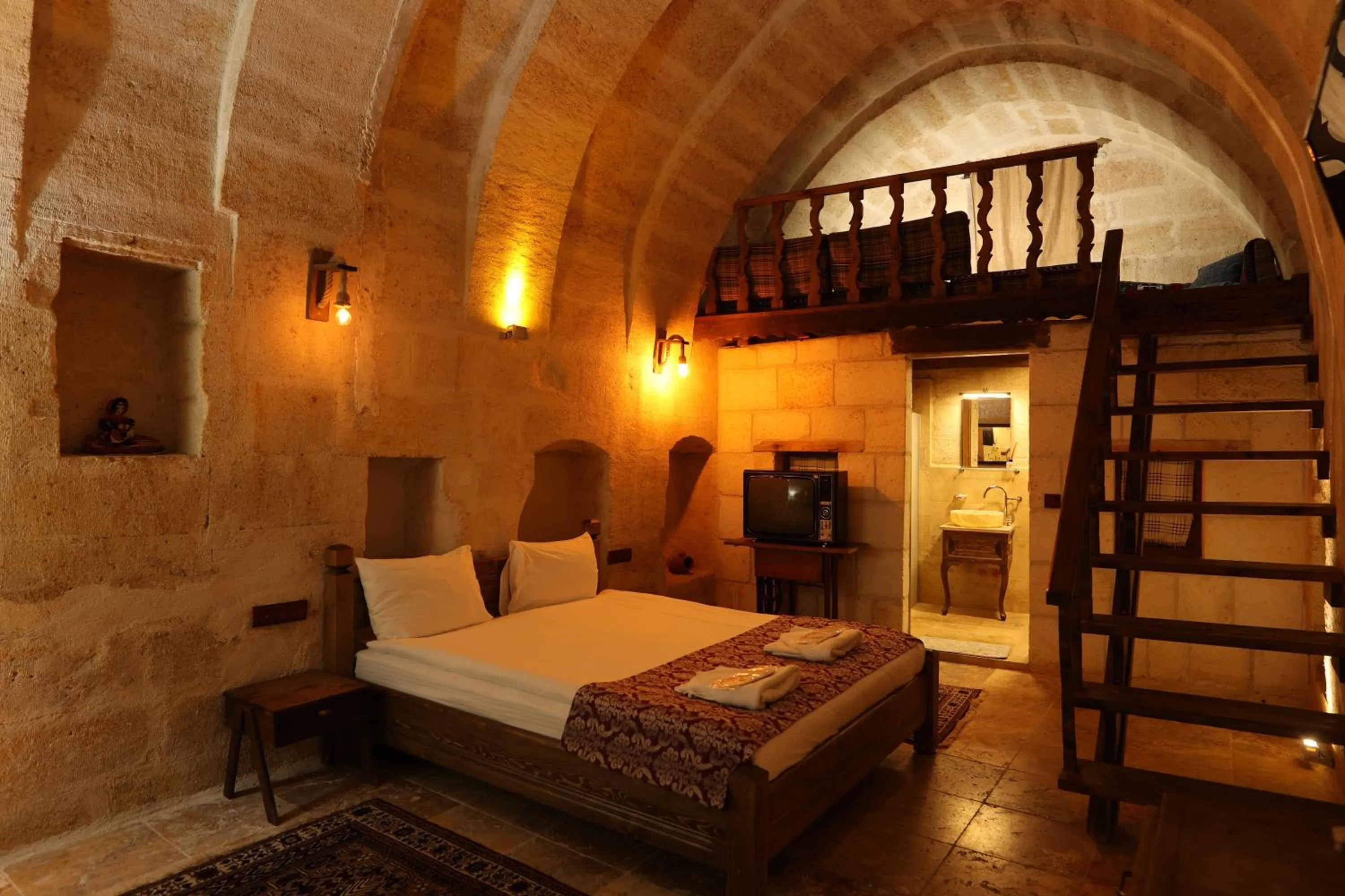 Photo of the whole room, Bed in Zanta Suite Hotel