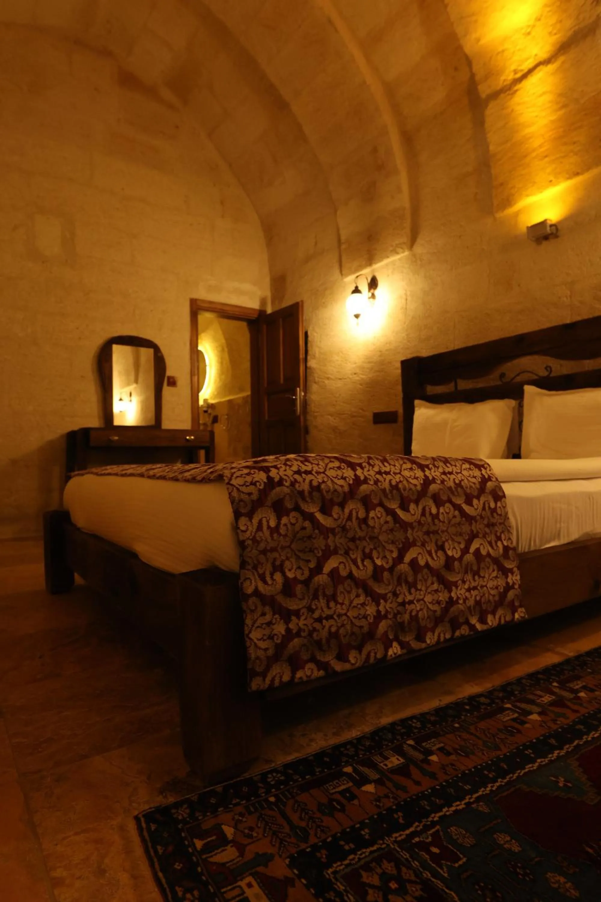 Bed in Zanta Suite Hotel