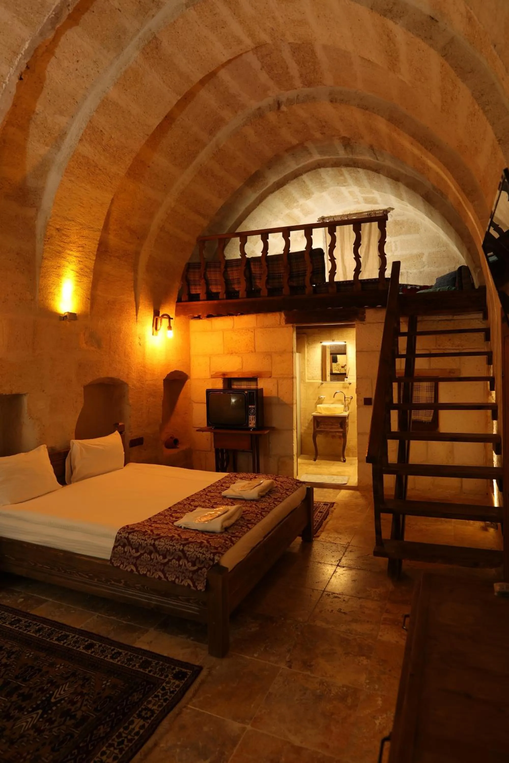 Bed in Zanta Suite Hotel