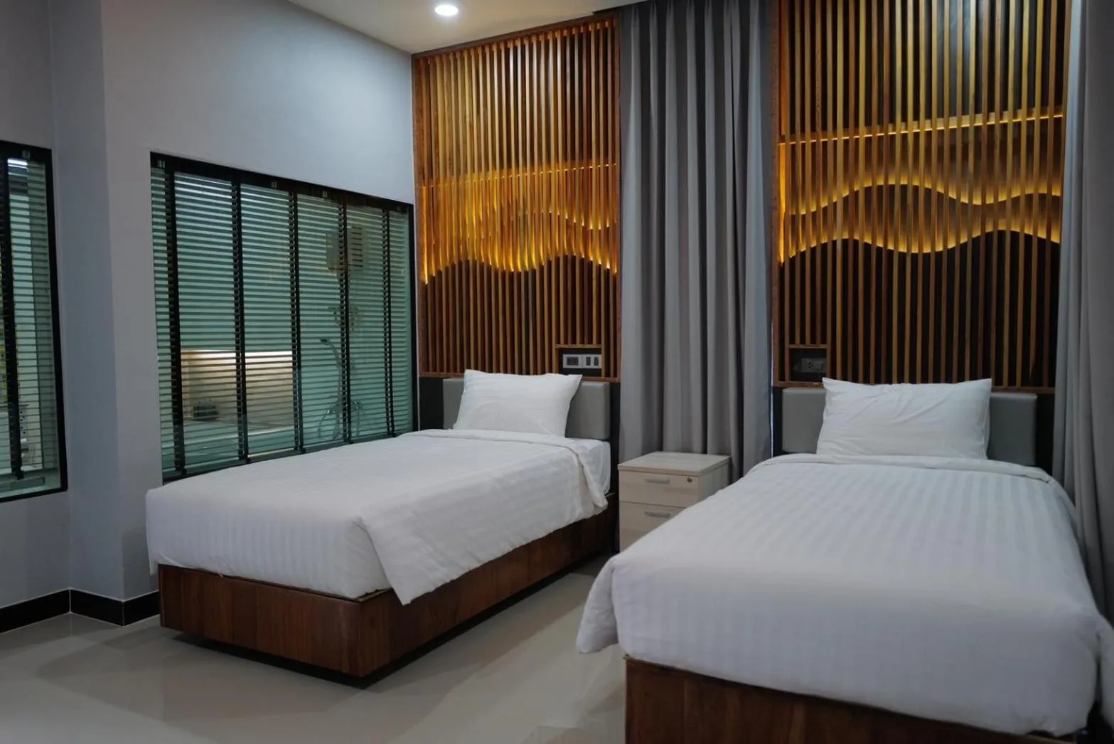 Bedroom, Bed in Phutara Resort and Spa