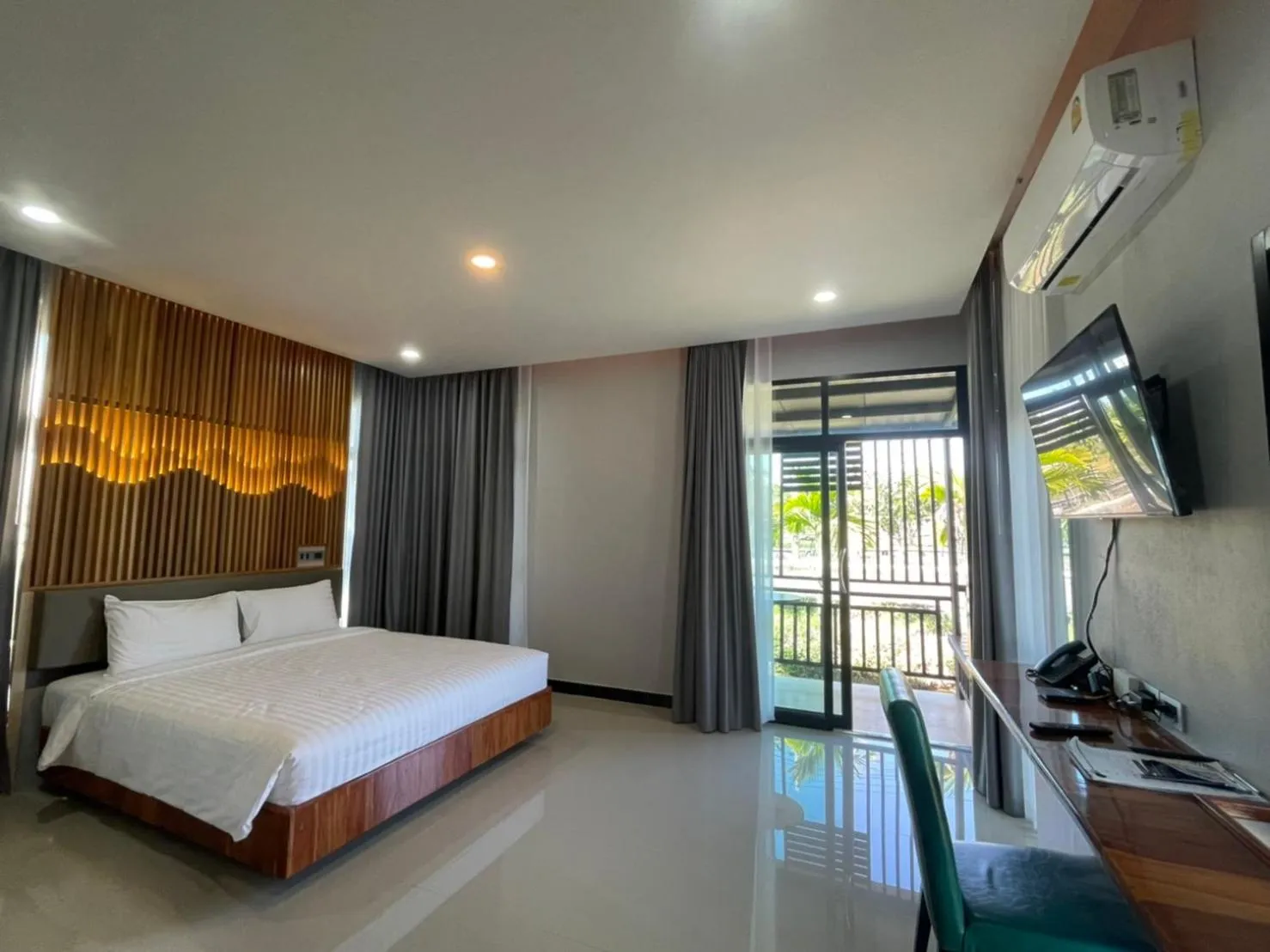 Photo of the whole room, Bed in Phutara Resort and Spa